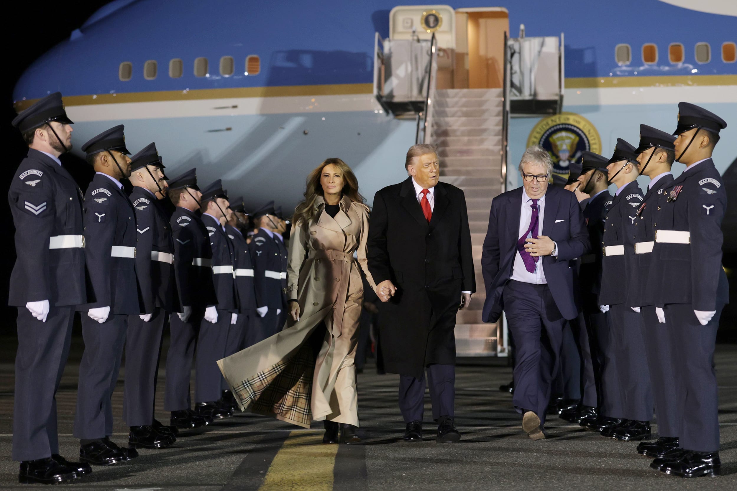 President Donald Trump and first lady Melania Trump exit Air Force One
