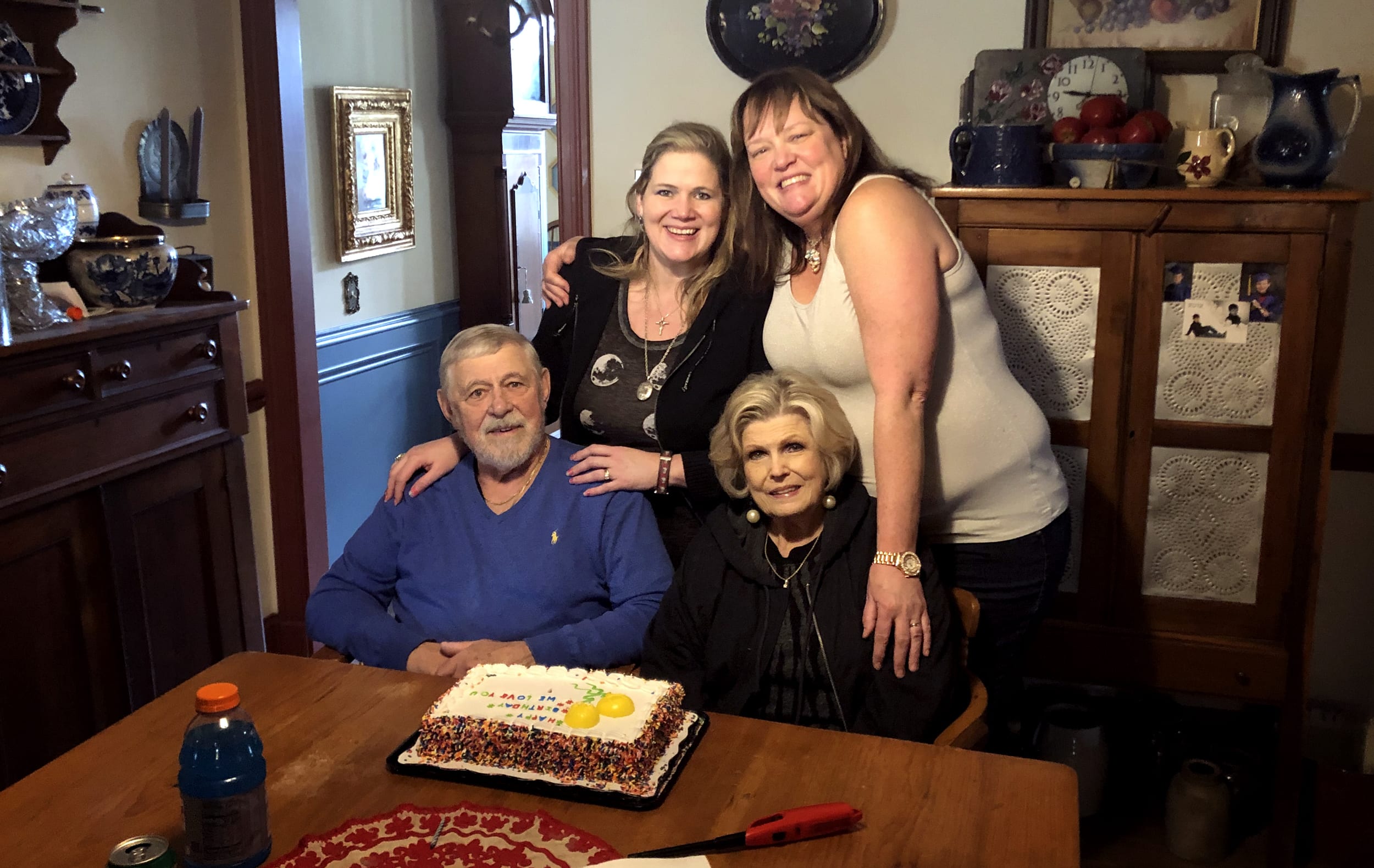 Image: Frank Carter celebrated his 82nd birthday with his wife and daughters this past February. His daughter, Nicole, top right, noticed signs of cognitive problems in Carter about a week before he died from COVID-19.