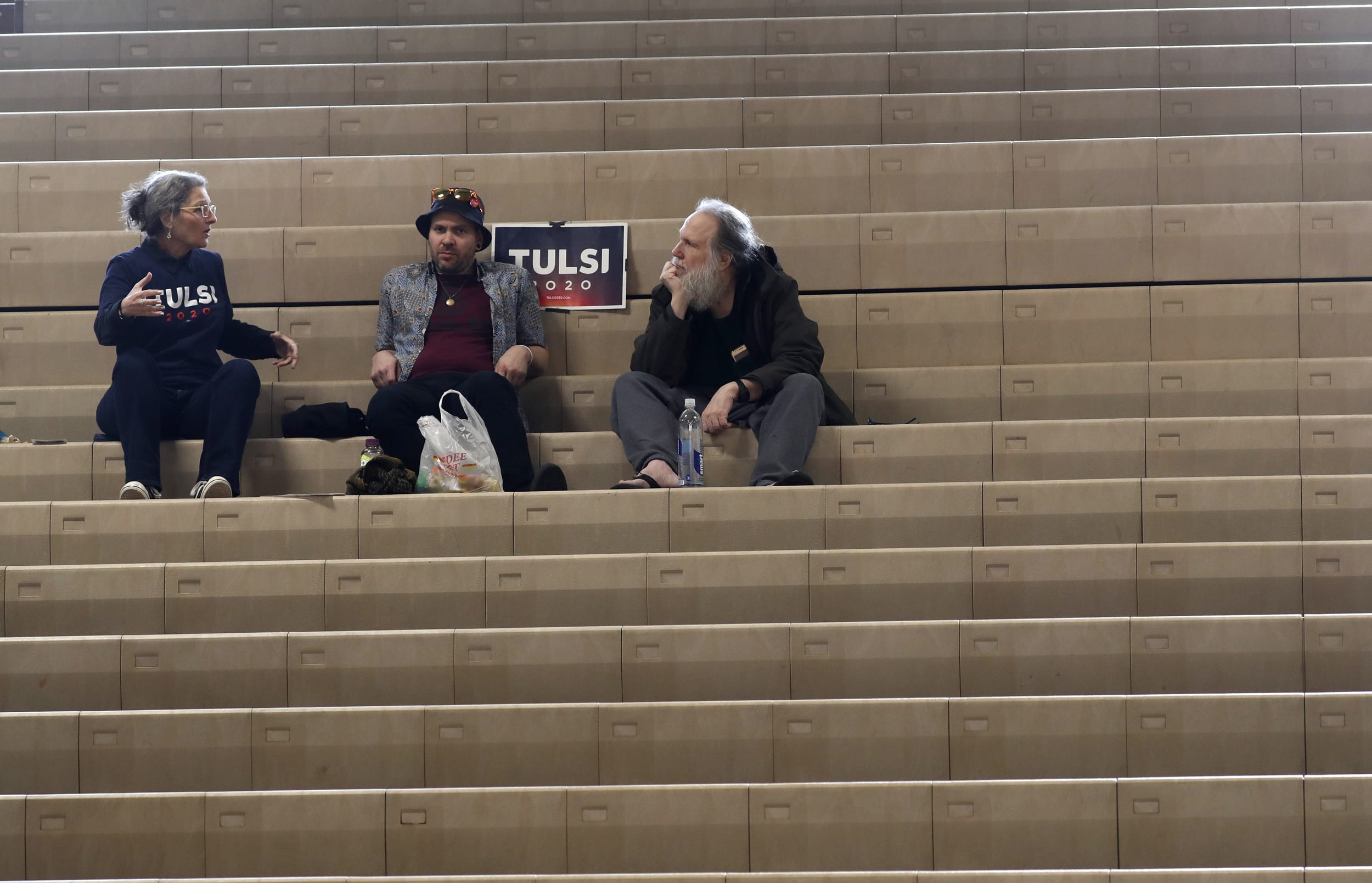 Image: Supporters of U.S. Democratic presidential candidate Tulsi Gabbard sit alone at Cheyenne High School in North Las Vegas, Nevada, U.S.