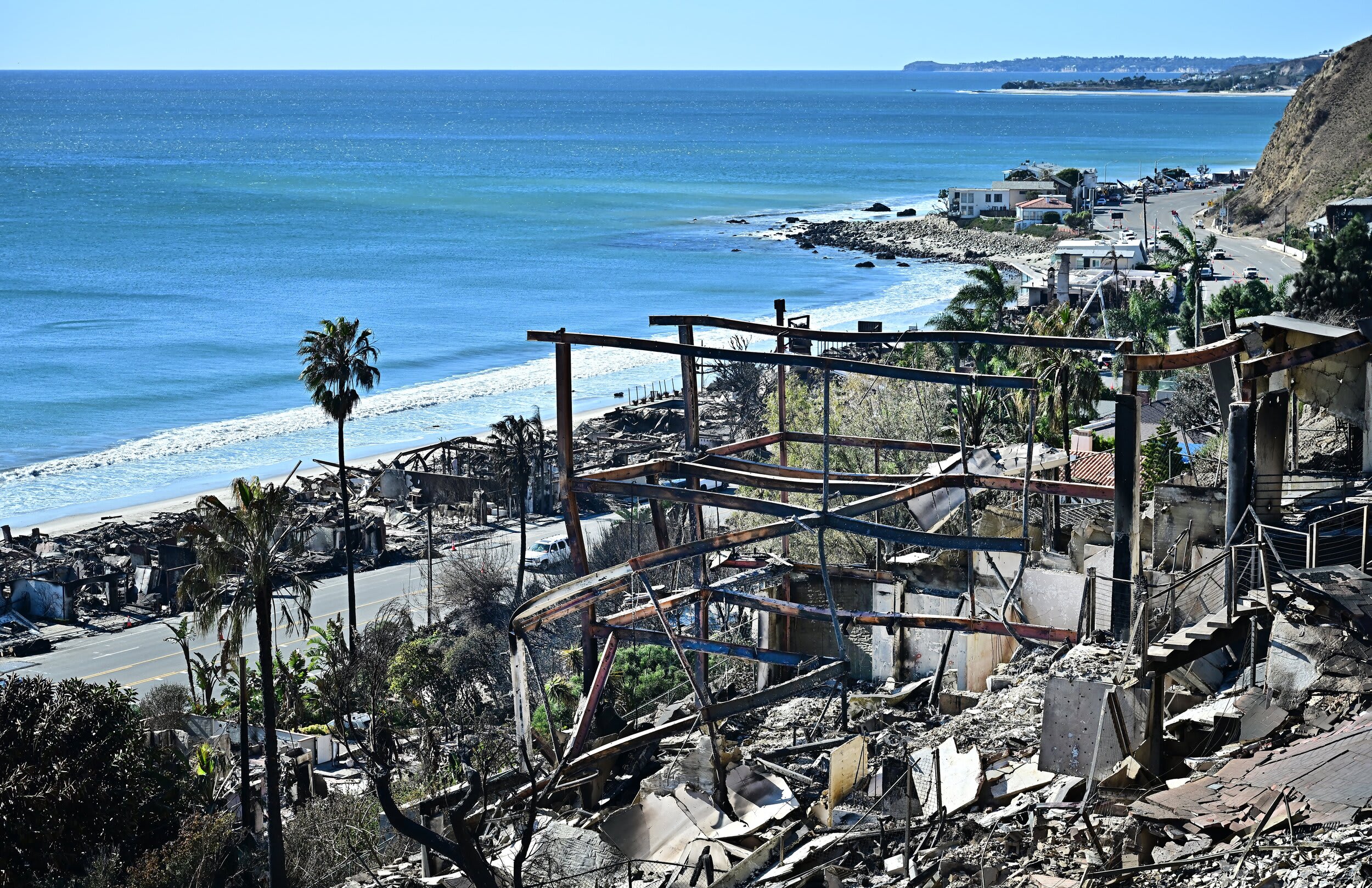 Image: Fire-ravaged beach property overlooking the Pacific Ocean that burned as a result of the Palisades Fire in Malibu, Calif.