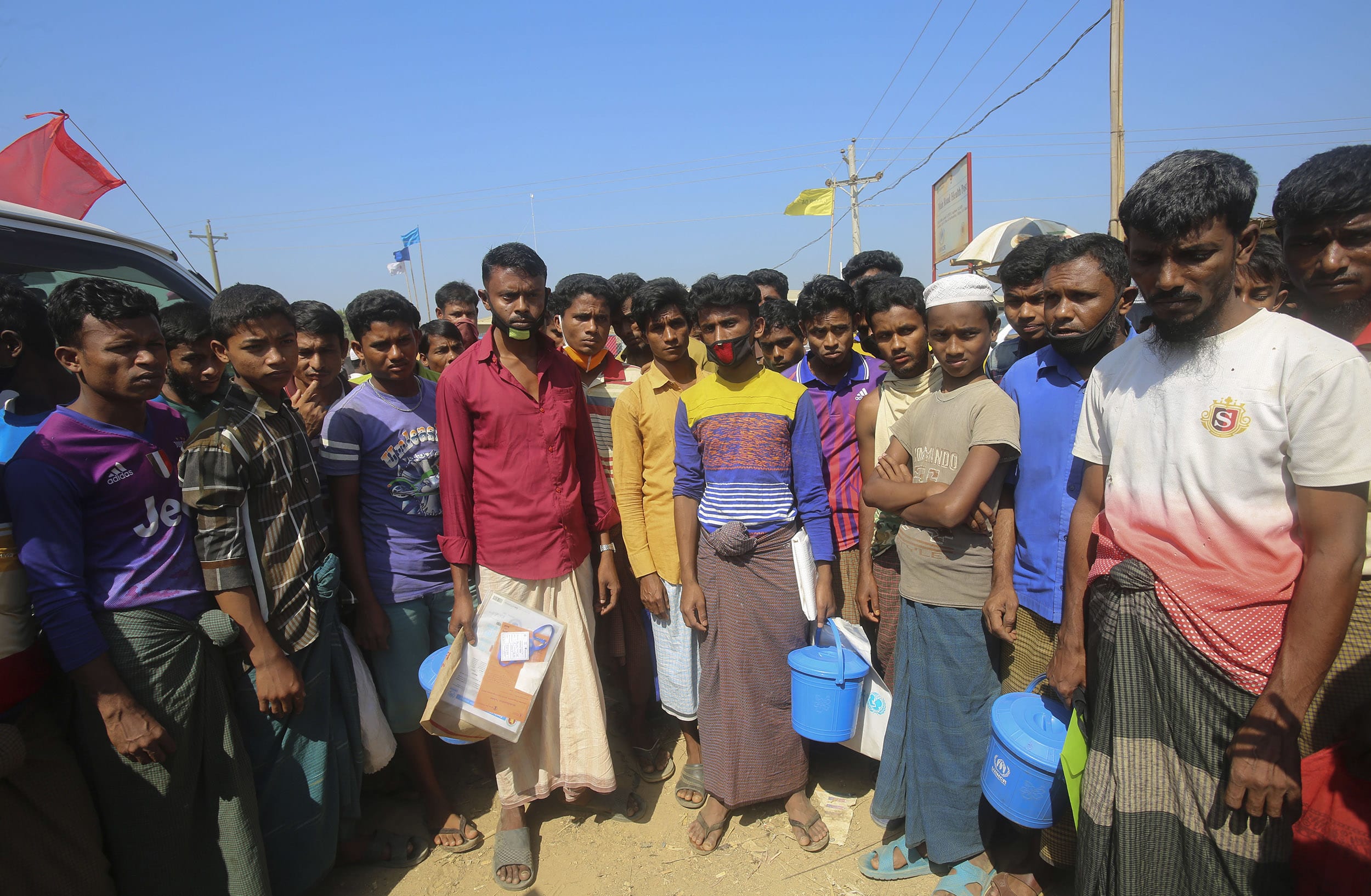 Image: Rohingya refugees stand at the Kutupalong refugee camp in Bangladesh on Wednesday. Aid workers are bracing for a possible outbreak of the virus in one of the world's largest refugee camps.