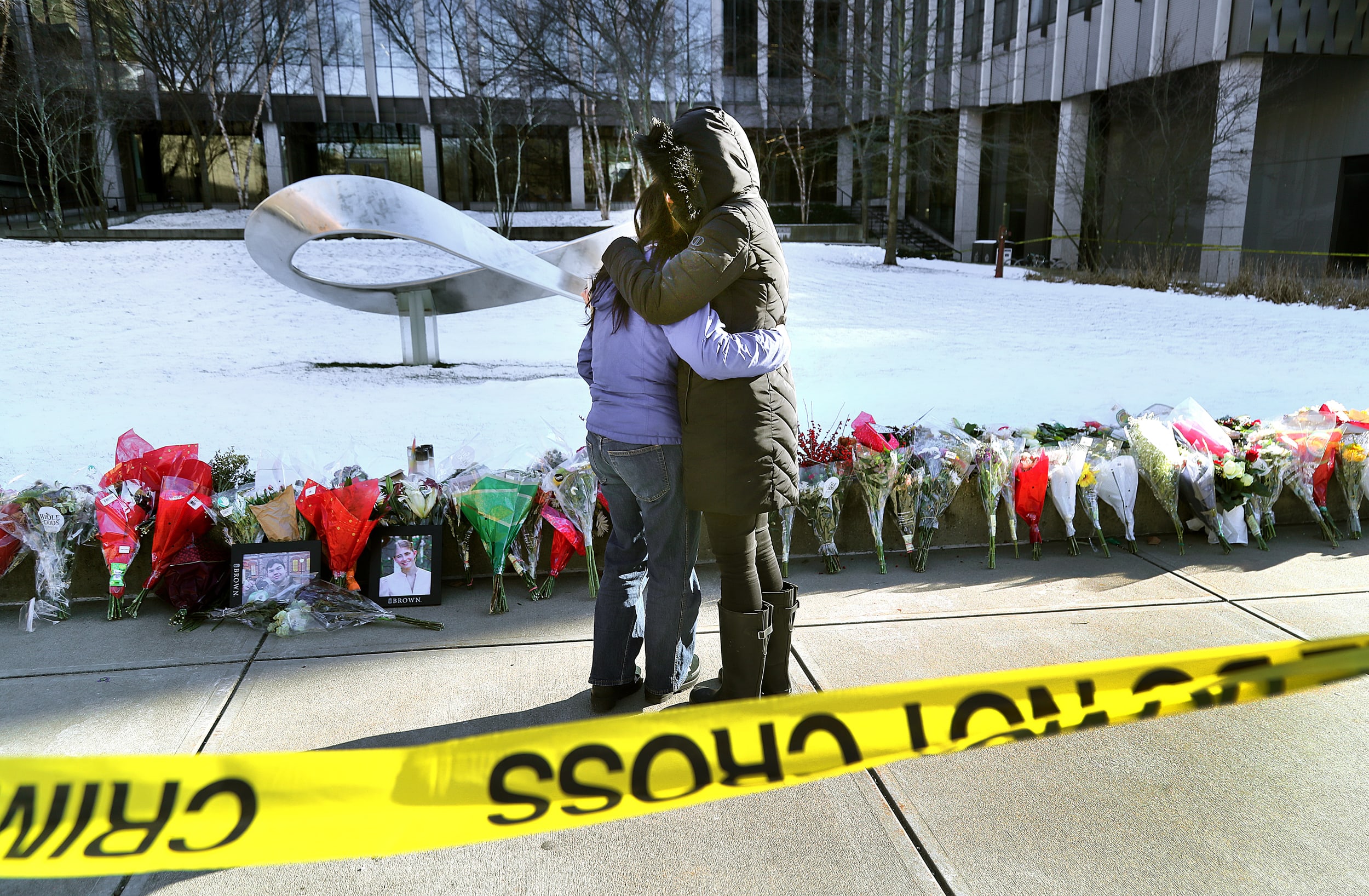 Anxiety over pace of Brown University shooting investigation mounts as search for killer continues