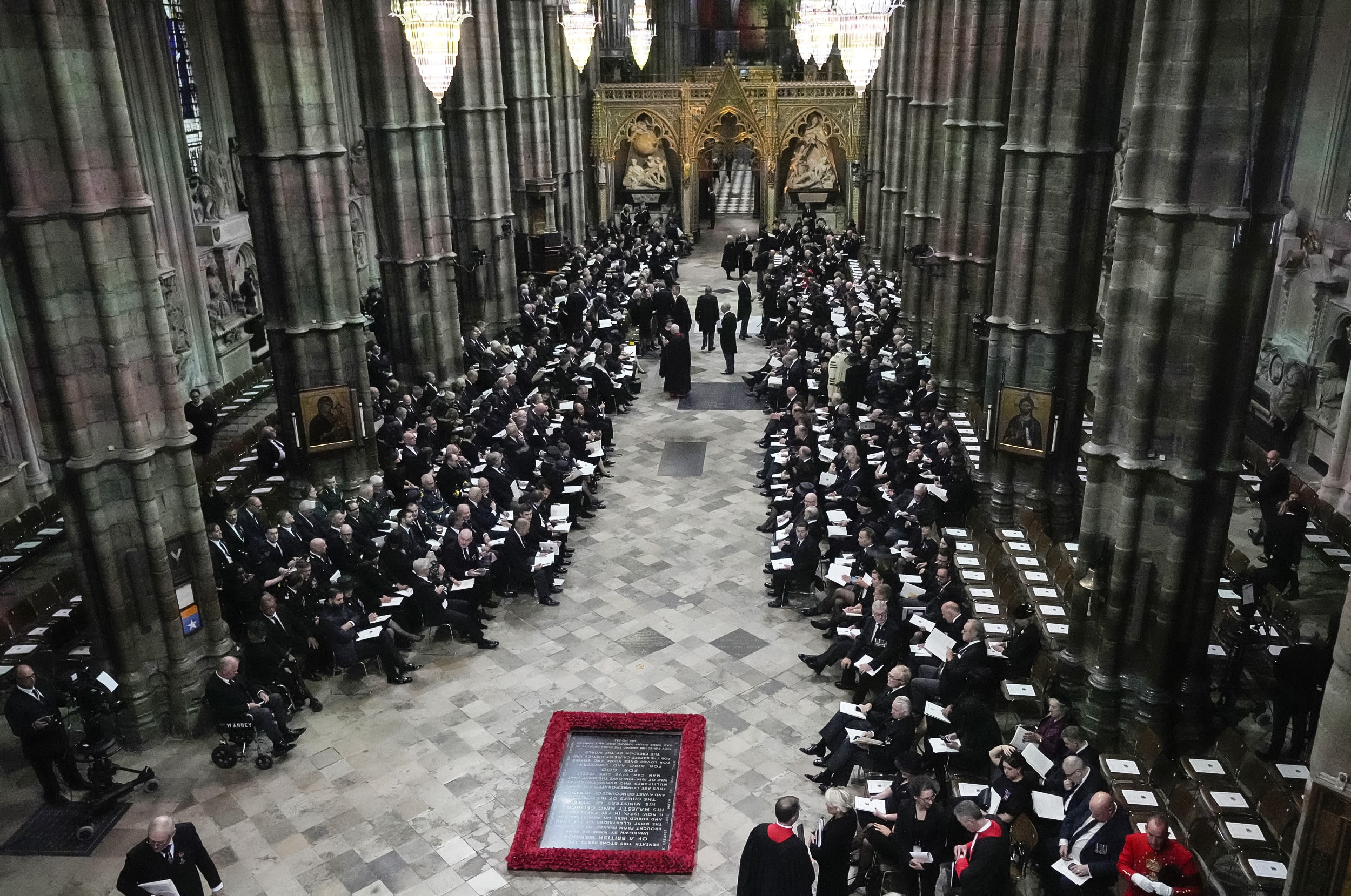 Image: Guests and officials begin to take their places prior to the coffin of Queen Elizabeth II being carried into Westminster Abbey for her funeral in London, on Sept. 19, 2022.
