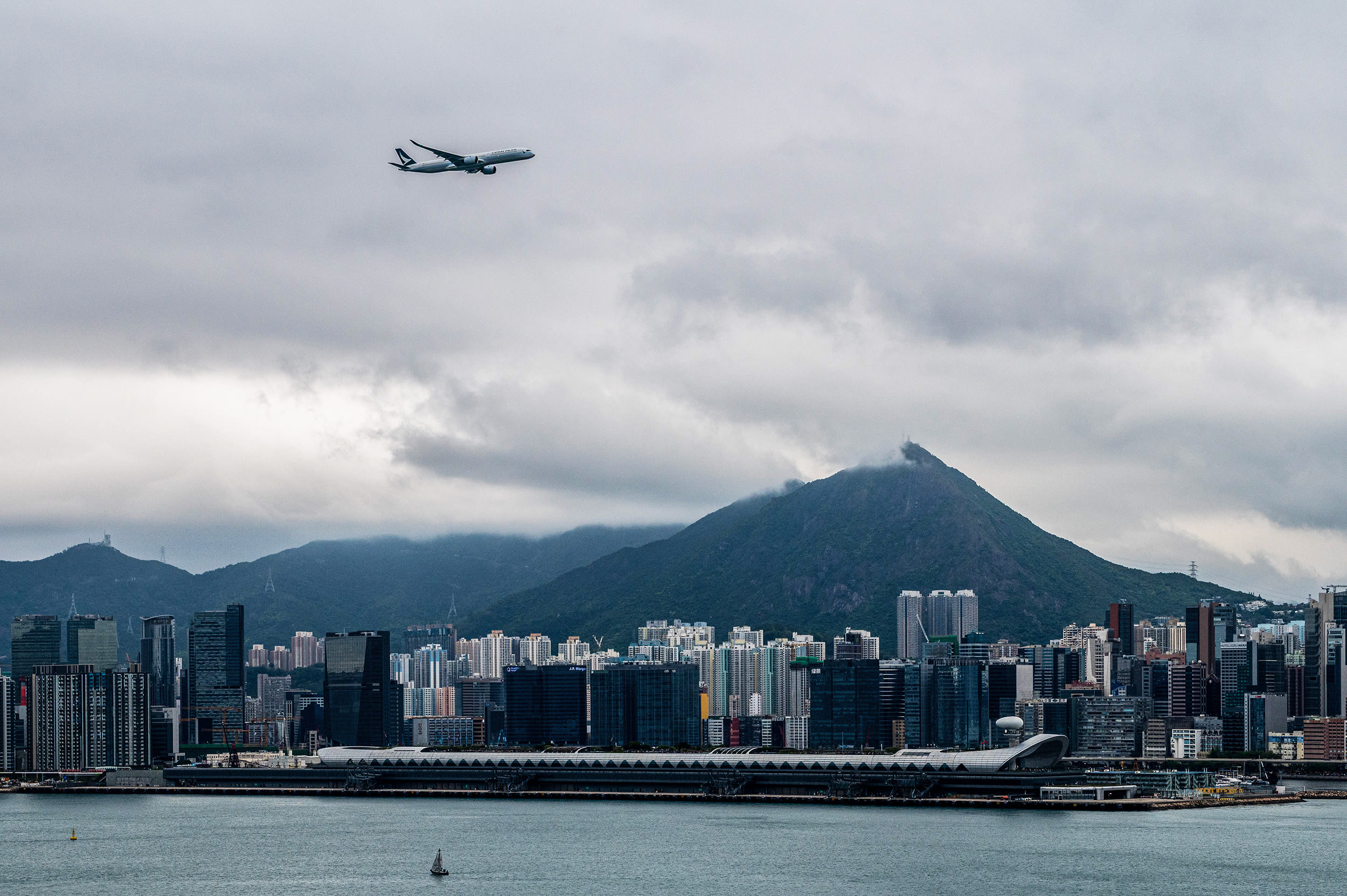 A Cathay Pacific Airbus A350 performs a flypast over the