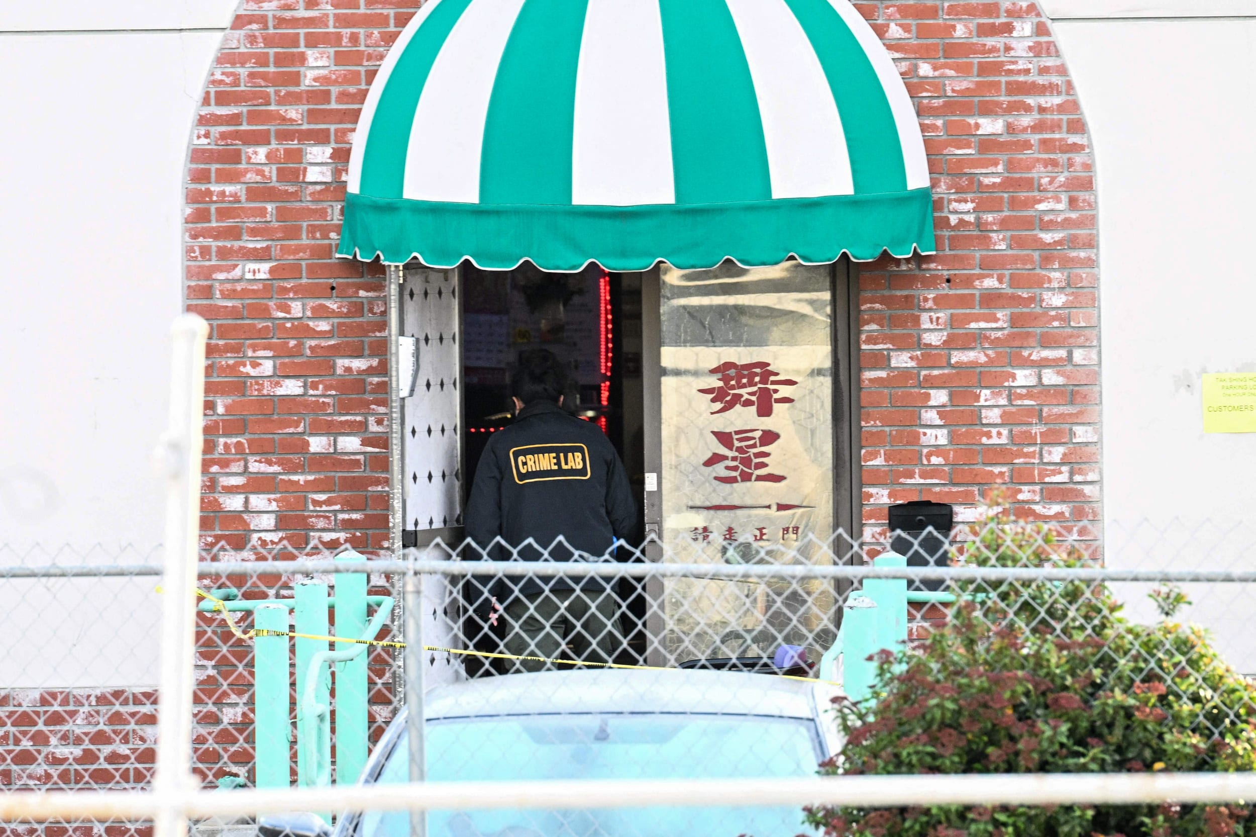 Investigators work at the scene of a mass shooting in Monterey Park, Calif., on Jan. 22, 2023.