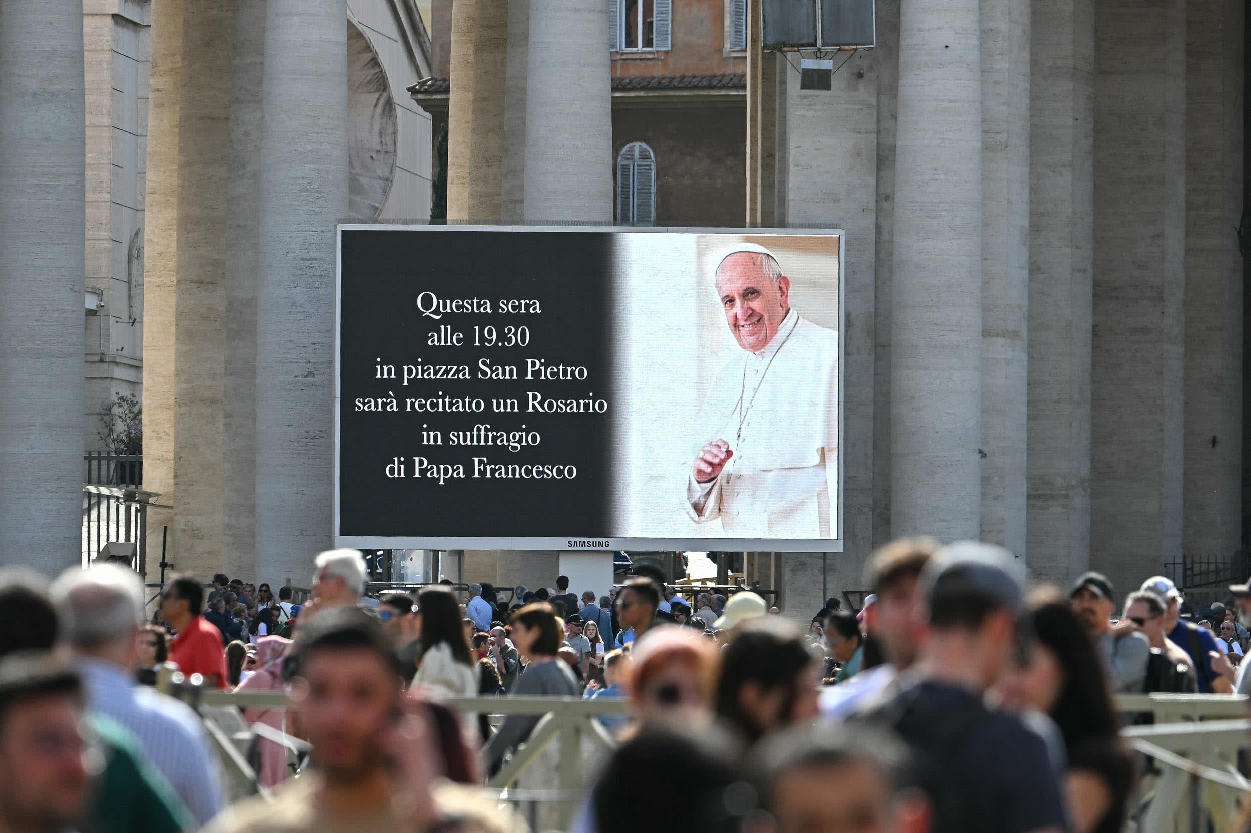 A screen in St. Peter's Square on April 21, 2025, announces that a Rosary will be recited this evening in suffrage of Pope Francis.