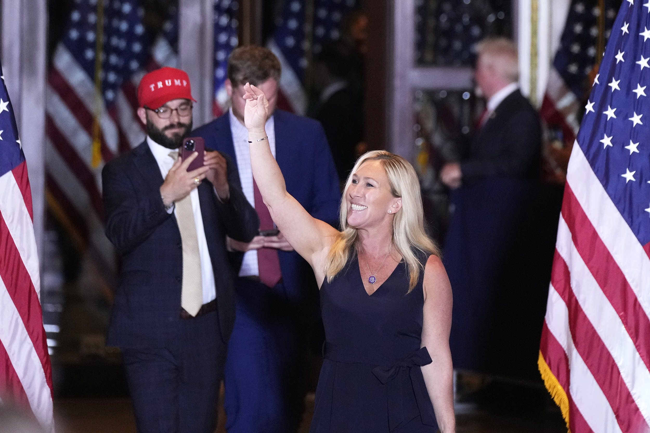 Rep. Marjorie Taylor Greene, R-Ga., before former President Donald Trump speaks at his Mar-a-Lago estate hours after being arraigned in New York City, Tuesday, April 4, 2023, in Palm Beach, Fla.