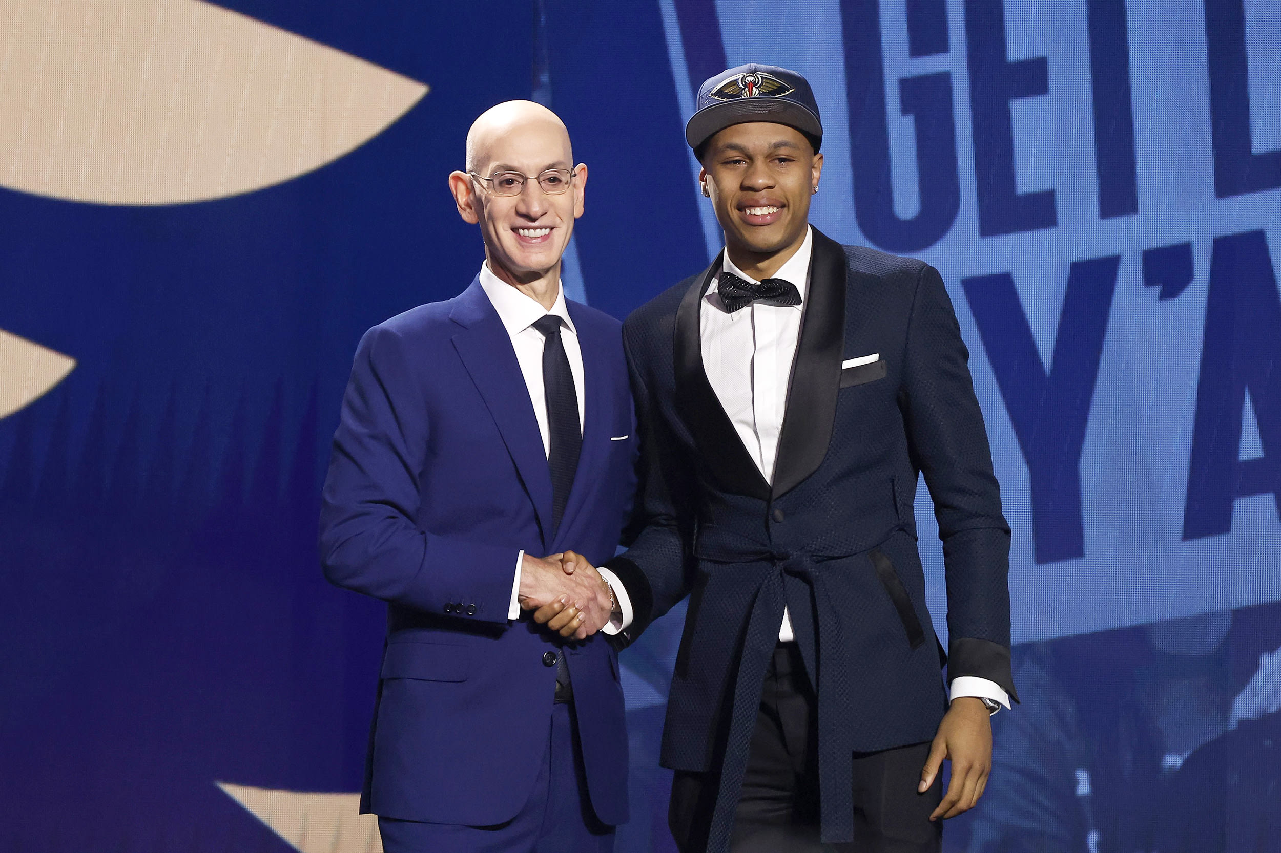 NEW YORK, NEW YORK - JUNE 22: Jordan Hawkins (R) poses with NBA commissioner Adam Silver (L) after being drafted 14th overall pick by the New Orleans Pelicans during the first round of the 2023 NBA Draft at Barclays Center on June 22, 2023 in the Brooklyn borough of New York City. 