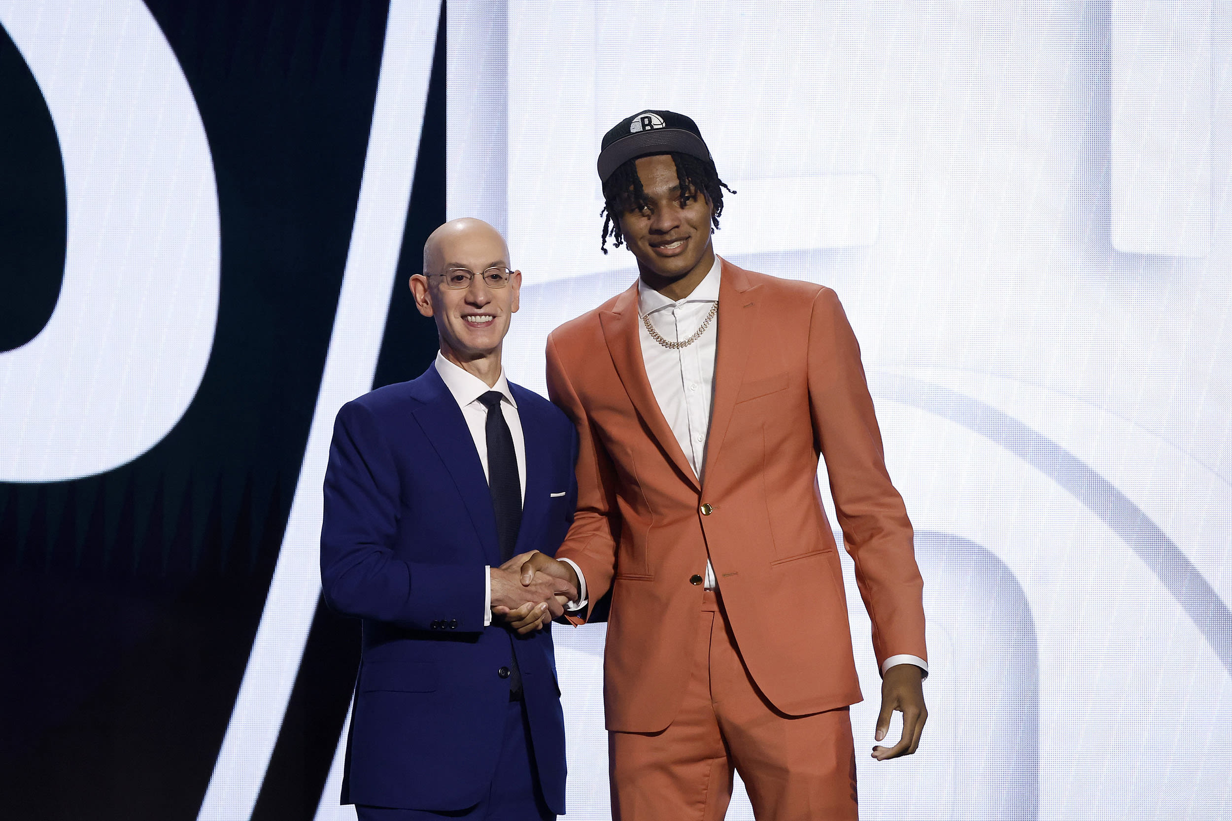 NEW YORK, NEW YORK - JUNE 22: Noah Clowney (R) poses with NBA commissioner Adam Silver after being drafted 21st overall pick by the Brooklyn Nets during the first round of the 2023 NBA Draft at Barclays Center on June 22, 2023 in the Brooklyn borough of New York City.