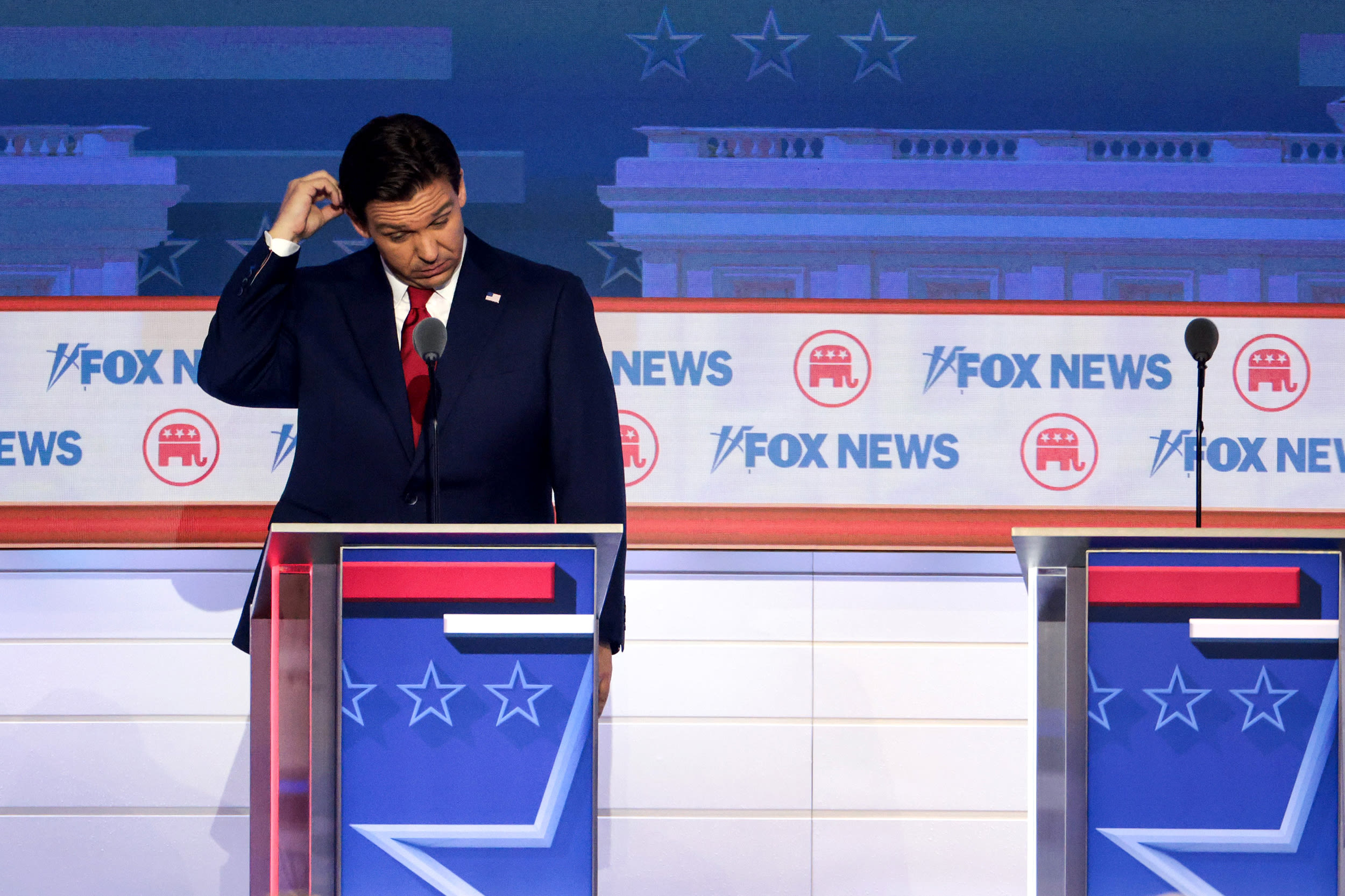 Image: Fla. Gov. Ron DeSantis pauses during the debate in Milwaukee.