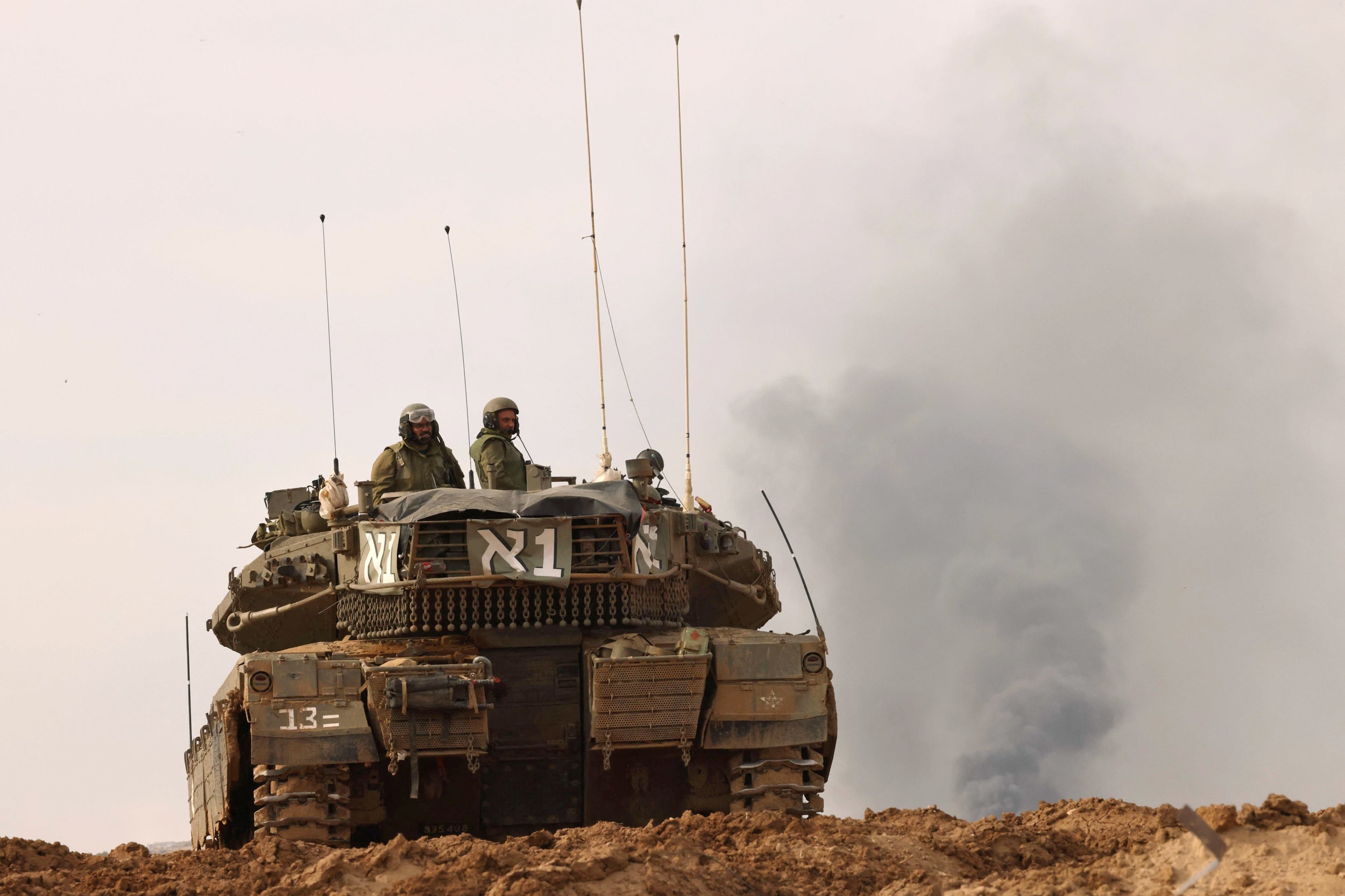 An Israeli tank repositions in an area near the Gaza Strip in southern Israel on Nov. 22, 2023.