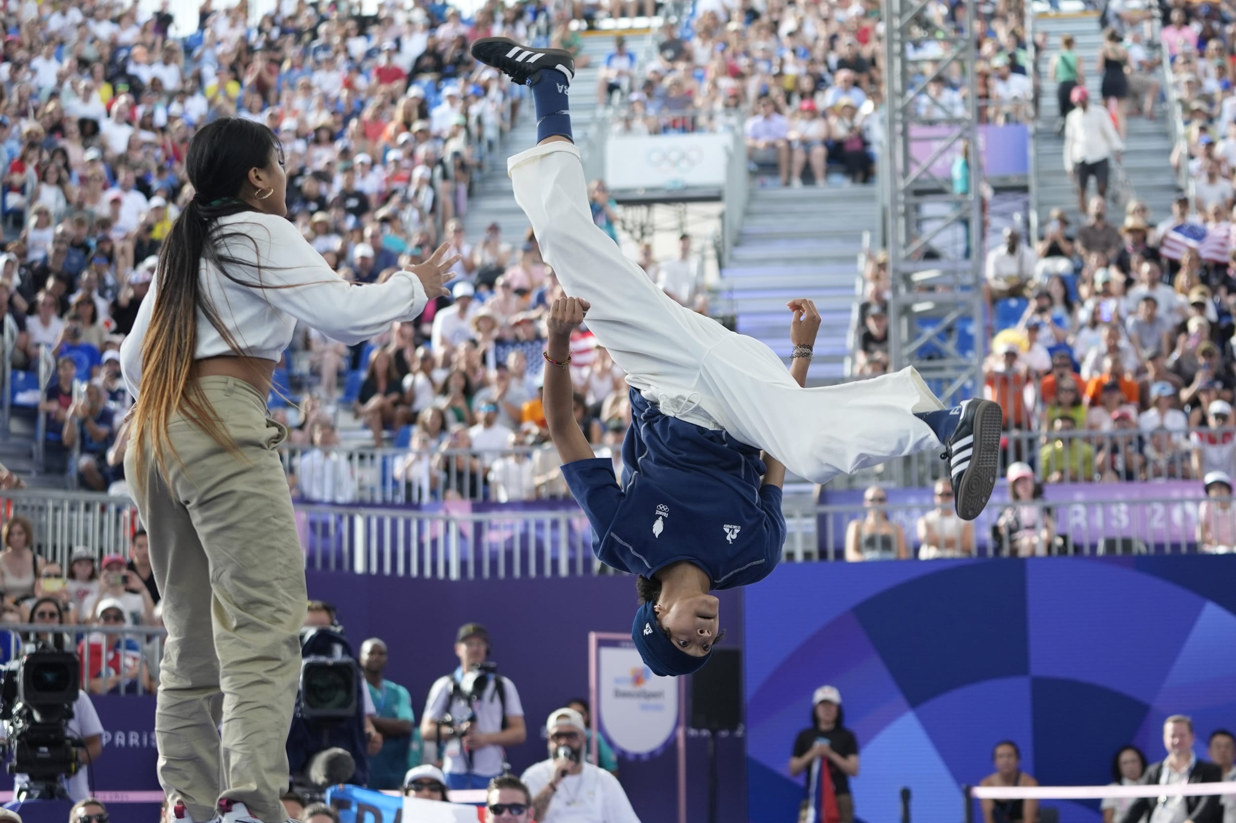 Sya Dembele, known as B-Girl Syssy, compete during the Round Robin Battle at the breaking competition at the Olympics