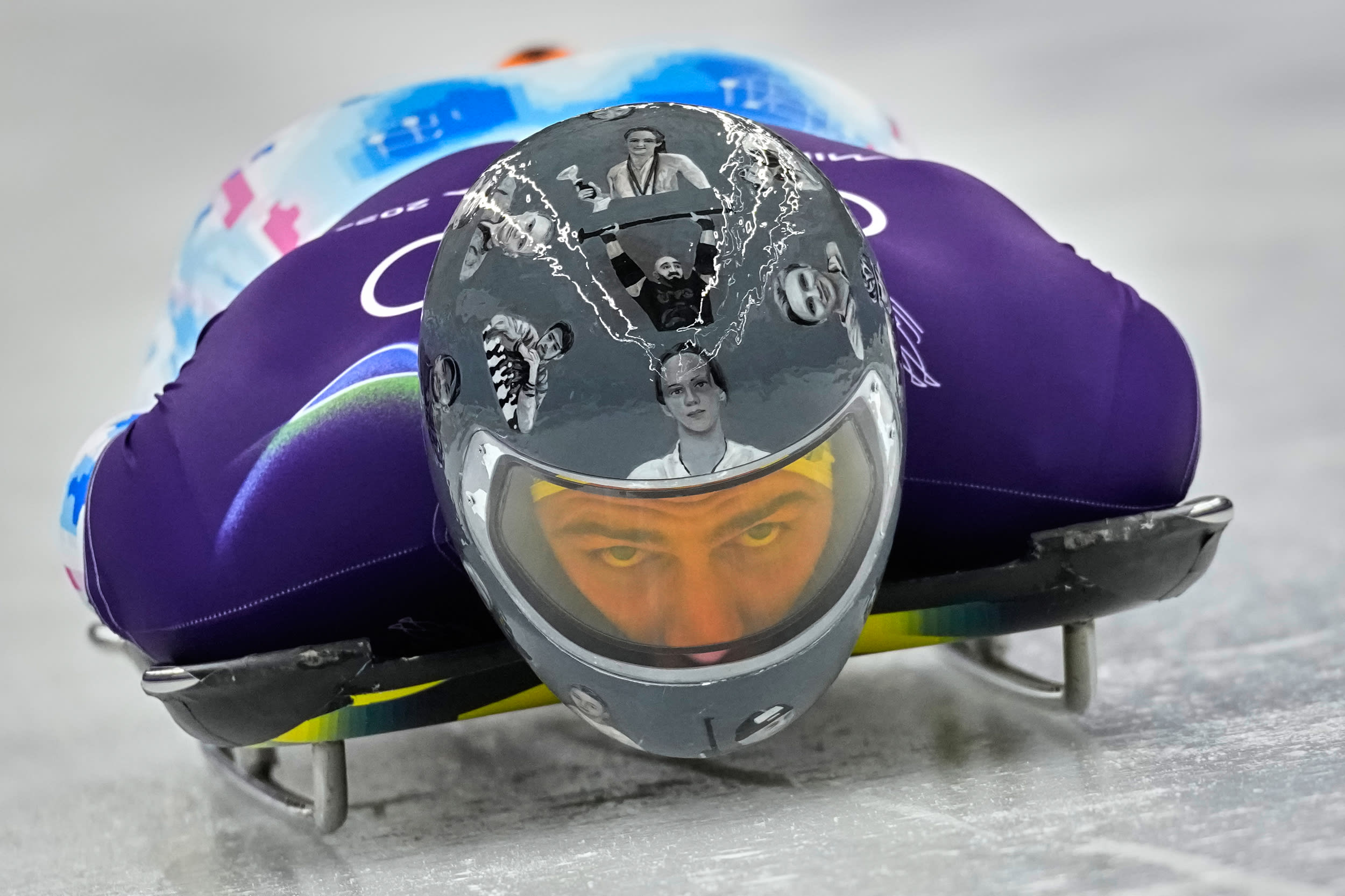 Vladyslav Heraskeych starts for a men's skeleton training session while facing downwards. 