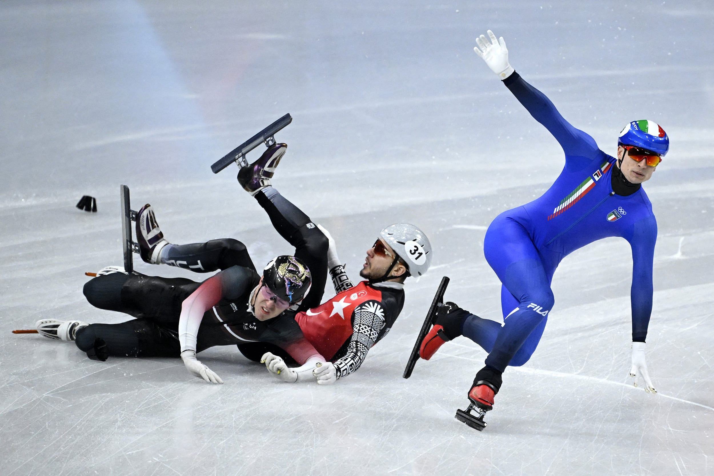 Italy's Pietro Sighel manages to keep his balance