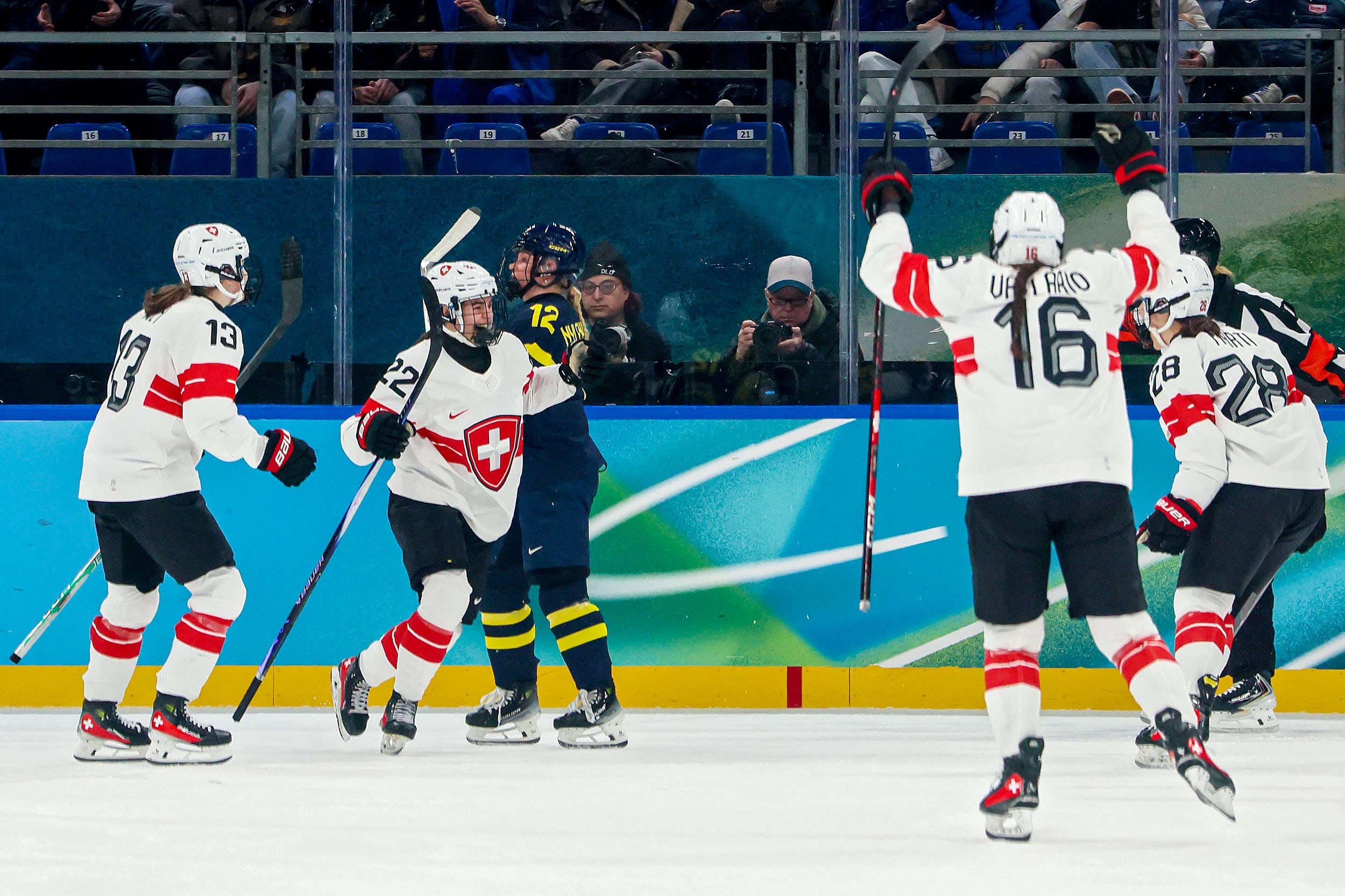 Sinja Leemann of Team Switzerland celebrates with teammates.