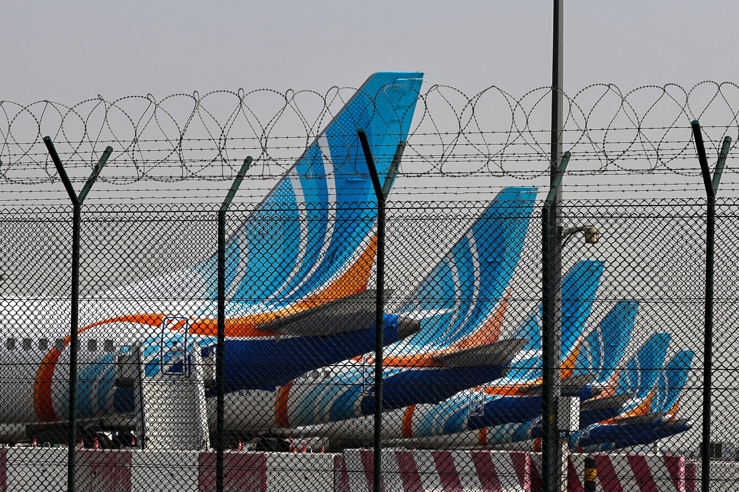 FlyDubai airline planes on the tarmac at Dubai International Airport on March 2, 2026.