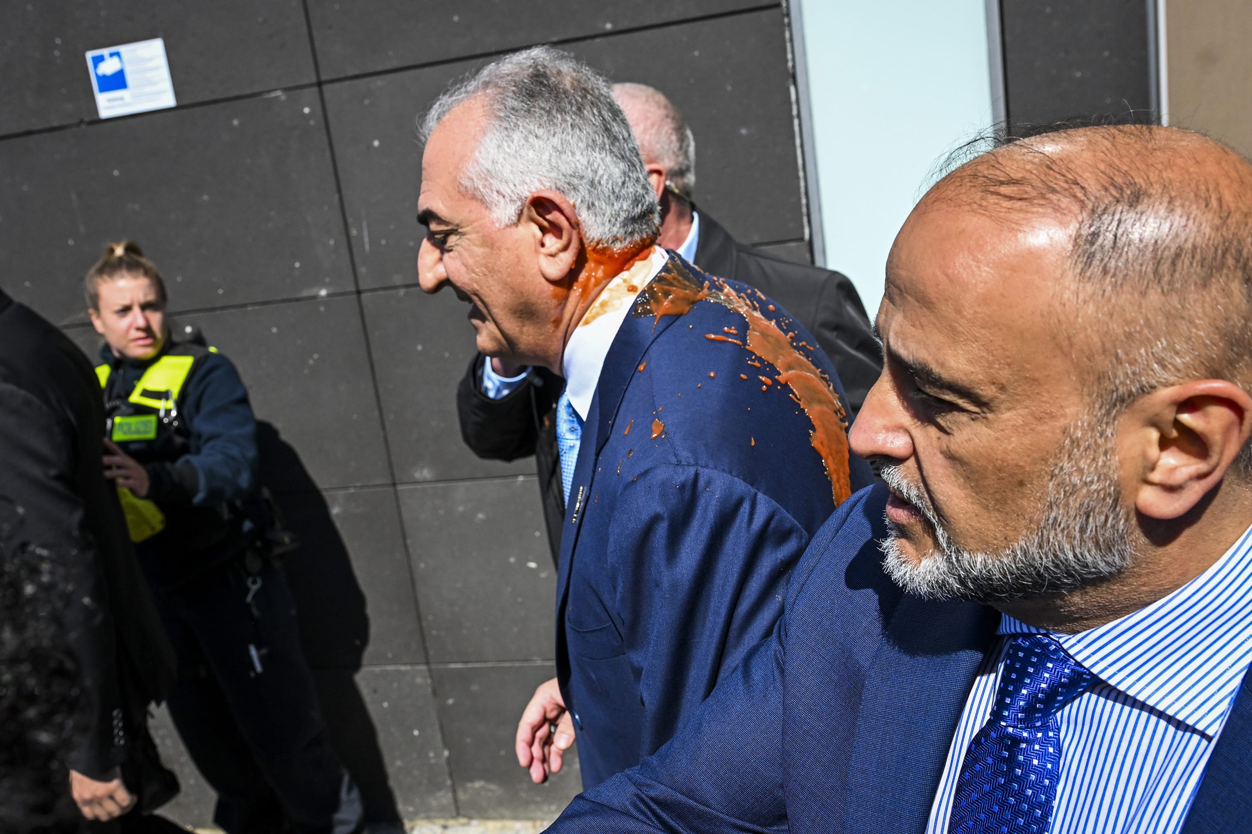 Red liquid thrown at exiled Iranian Prince Reza Pahlavi in Berlin