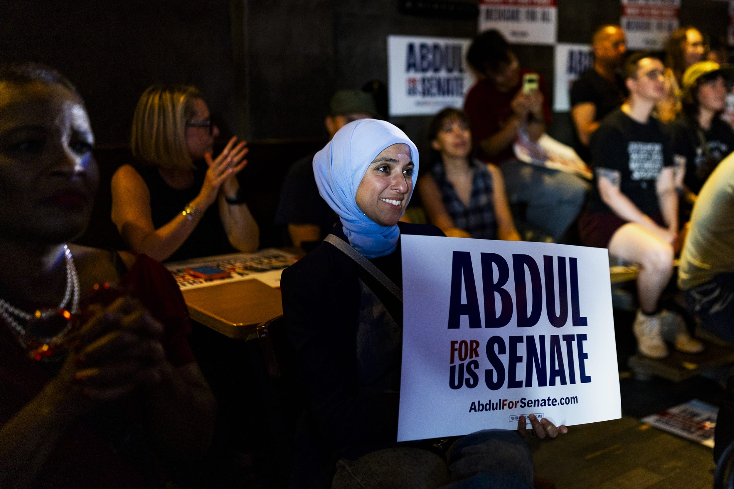 Attendees listen during a campaign event for Democratic U.S. Senate candidate Abdul El-Sayed.