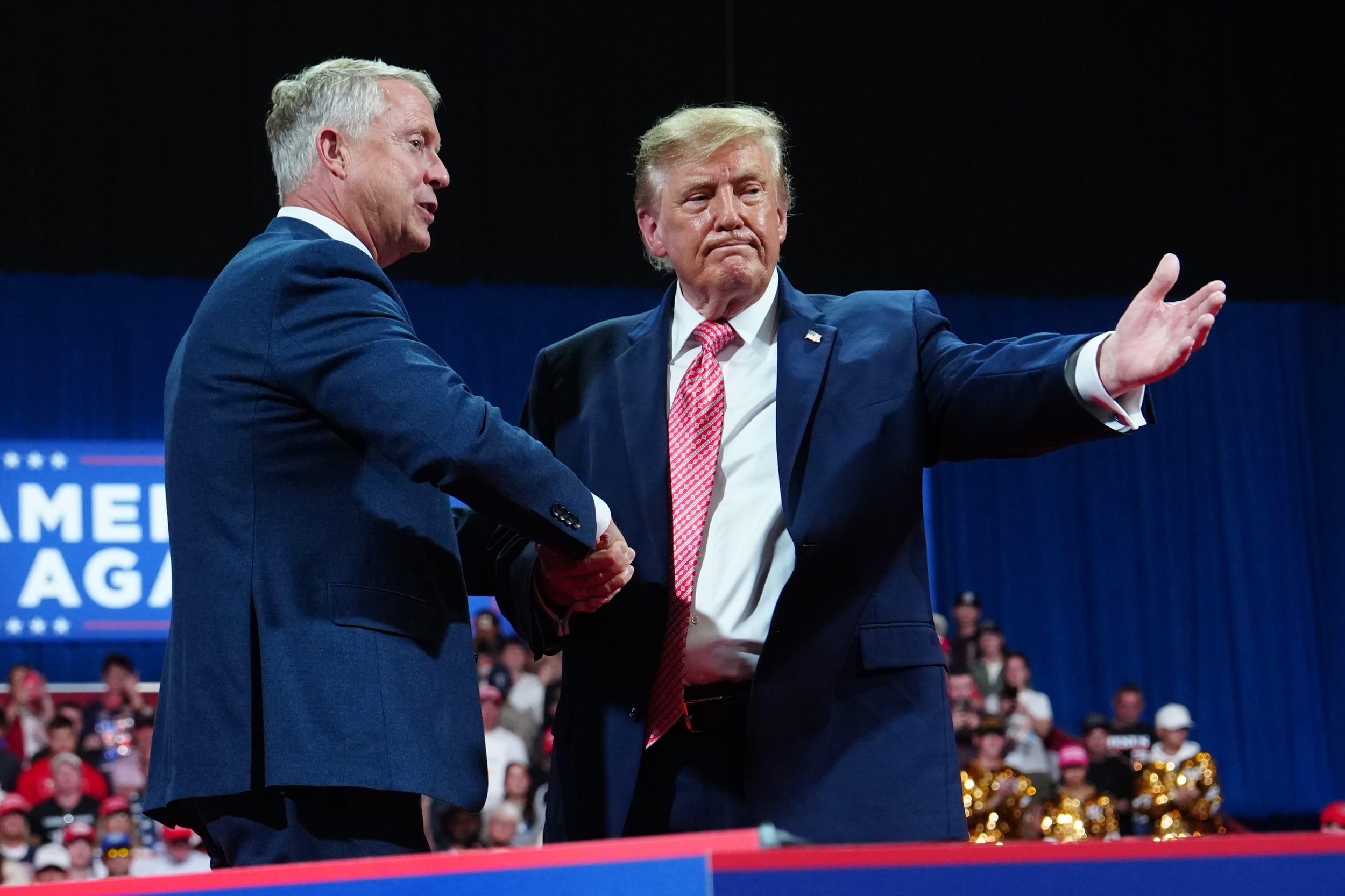 President Donald Trump shakes hands with Sen. Roger Marshall, R-Kan., at a campaign rally on Oct. 19, 2026, in Park City, Kan. 