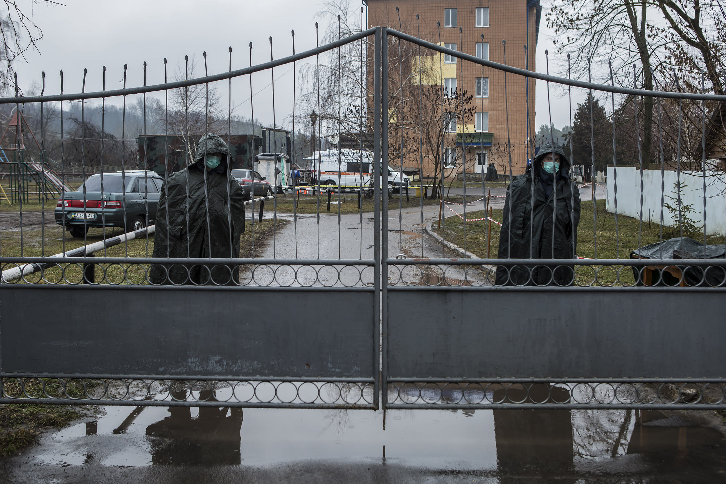 Image: National Guard officers at the medical facility where people evacuated from coronavirus-hit China's Hubei province are quarantined in Novi Sanzhary