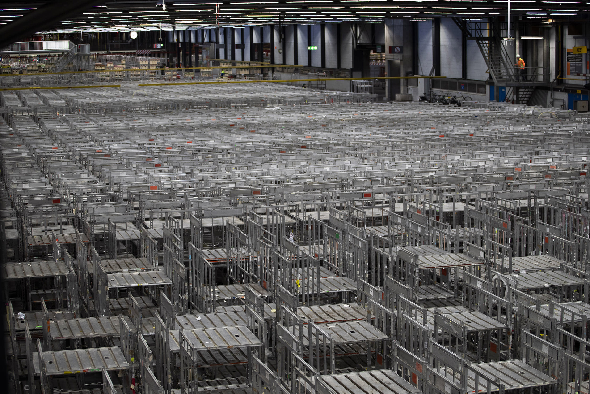 Image: Empty racks are seen at flower auctioneer Royal FloraHolland in Aalsmeer, Netherlands,