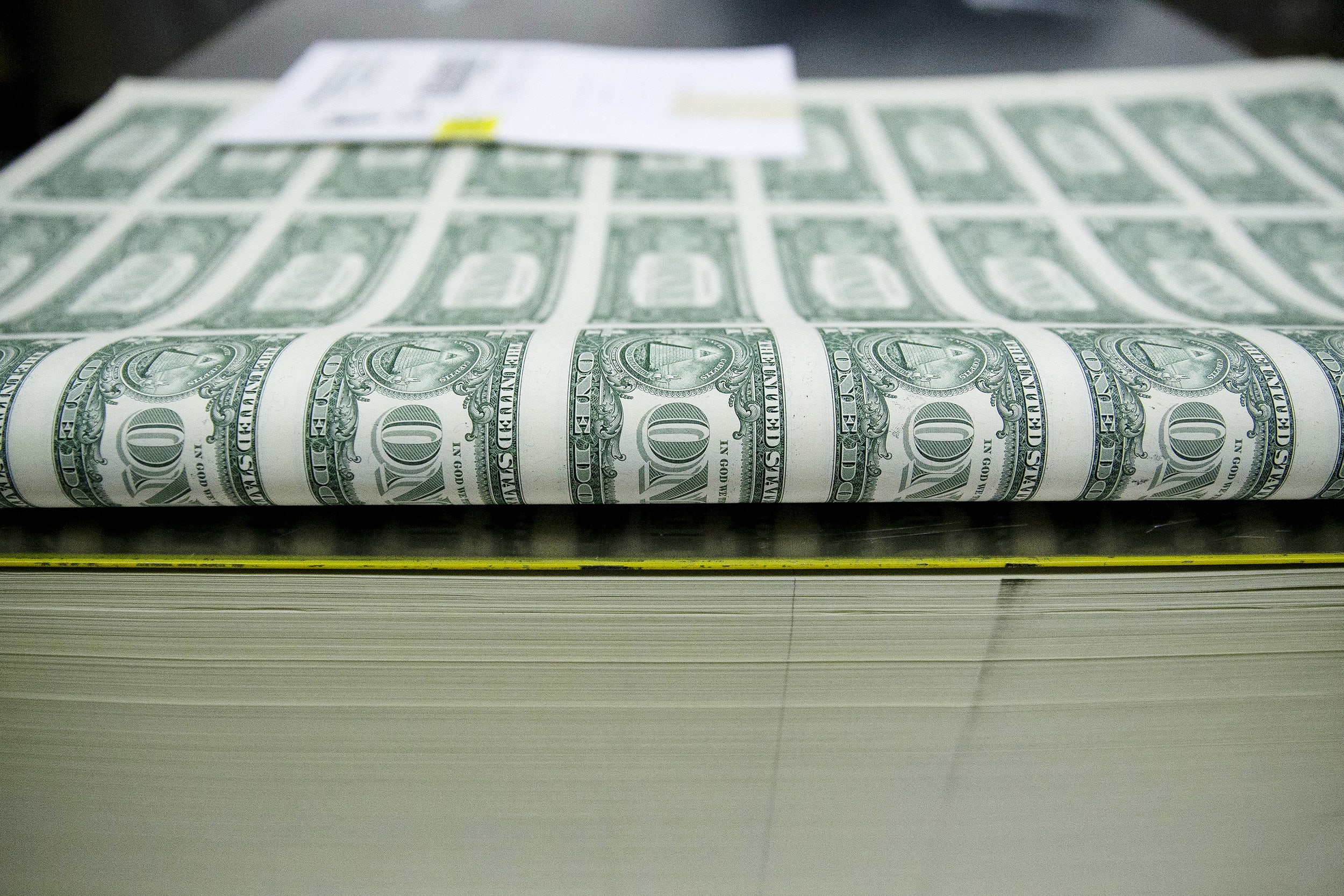 Operations At The Bureau Of Engraving And Printing As The $1 Bill Is Printed