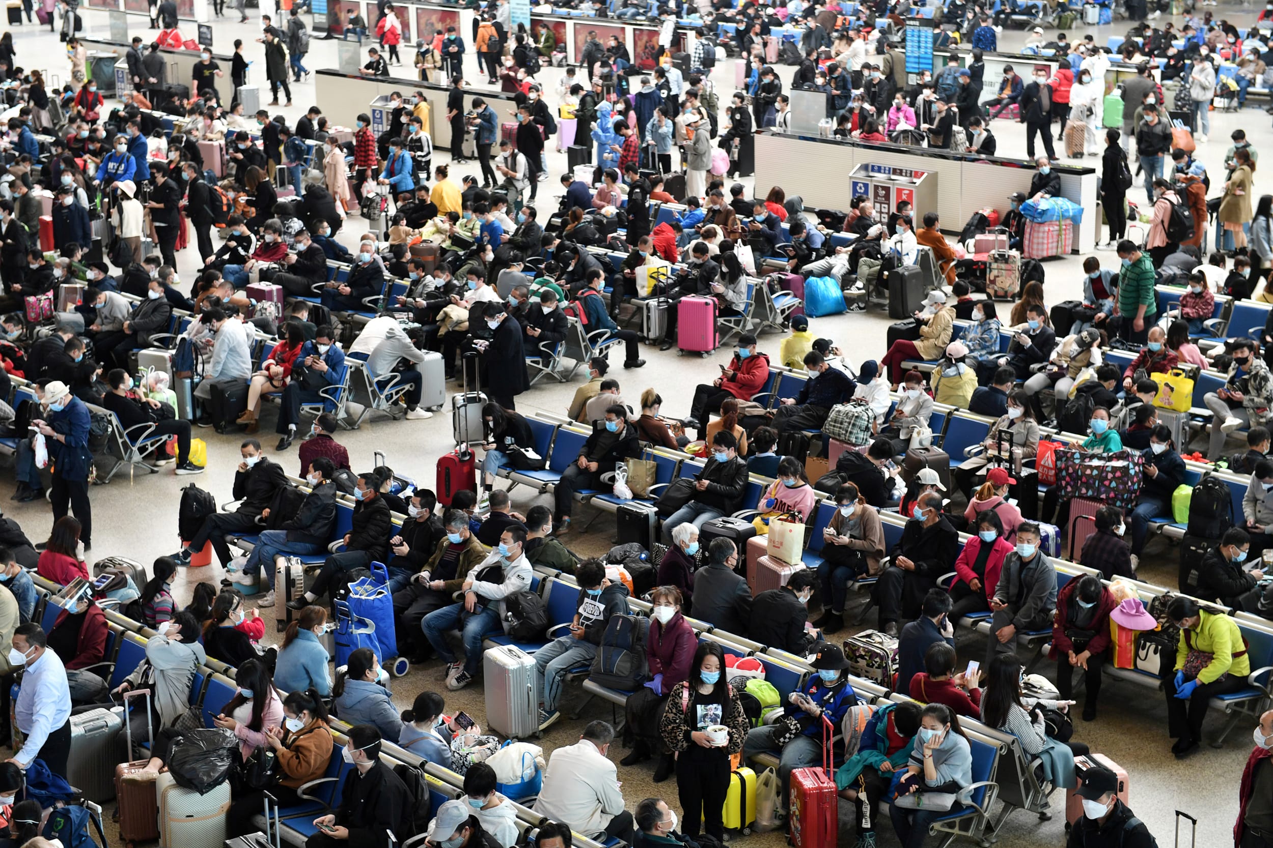 Travellers at Hankou Railway Station in Wuhan