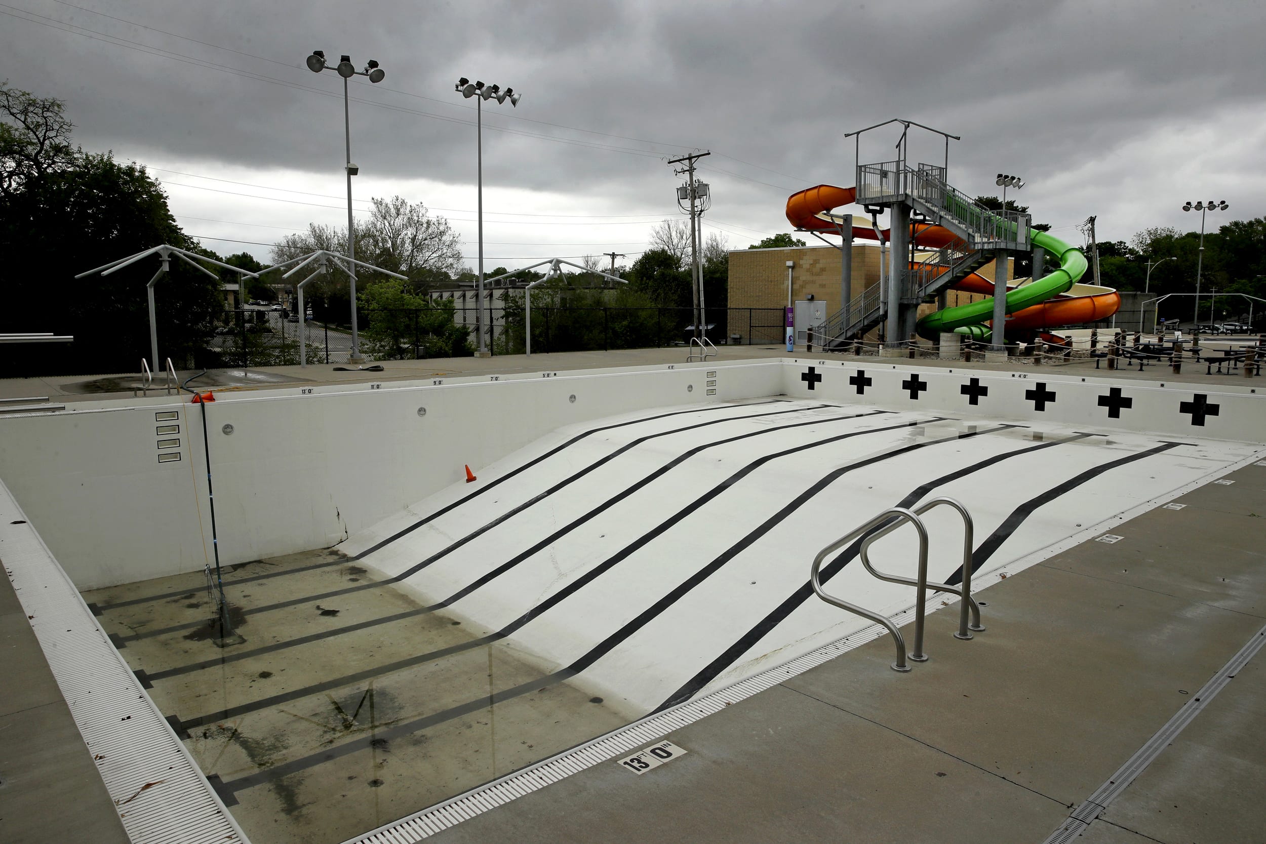 Image: A closed public pool in Mission, Kan., on May 15, 2020.
