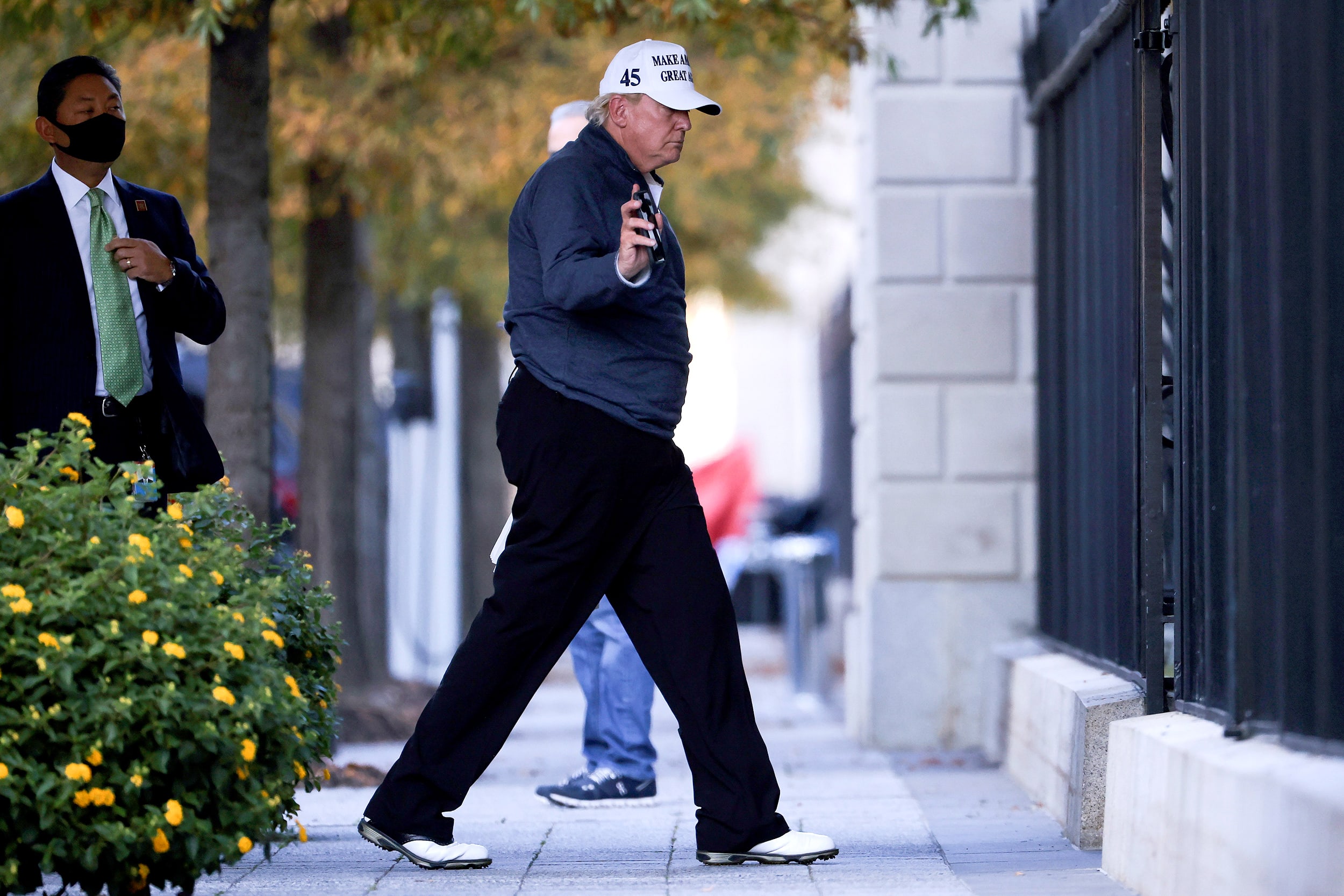 Image: U.S President Donald Trump returns to the White House after news media declared Democratic U.S. presidential nominee Joe Biden to be the winner of the 2020 U.S. presidential election, in Washington