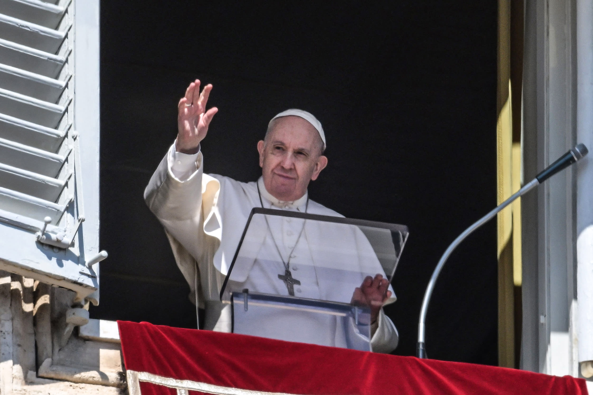 Image: Pope Francis waves from the window of the apostolic palace during the weekly Angelus prayer on March 13, 2022 in The Vatican.
