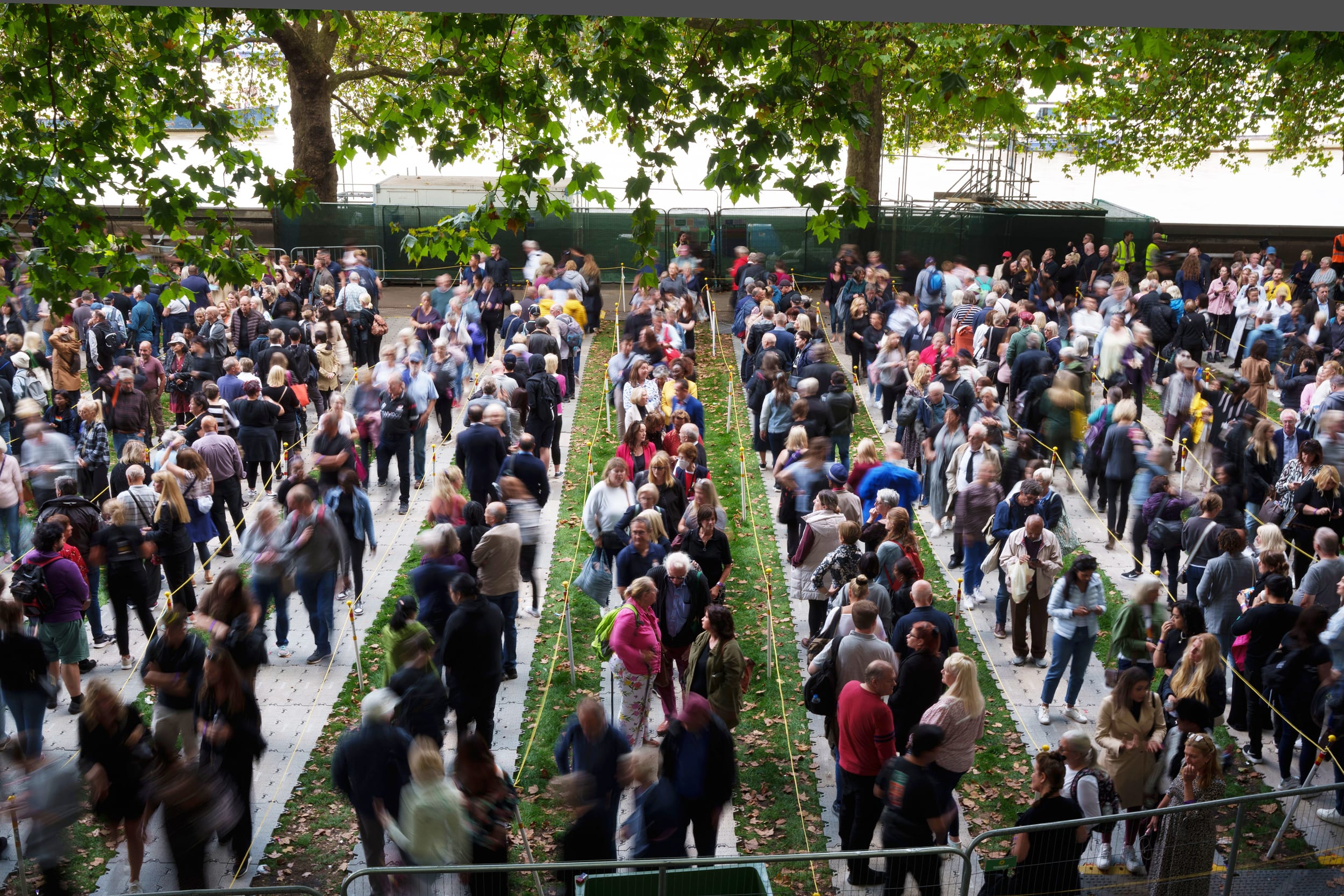 Members of the public wait in line to pay their respects to Queen Elizabeth II