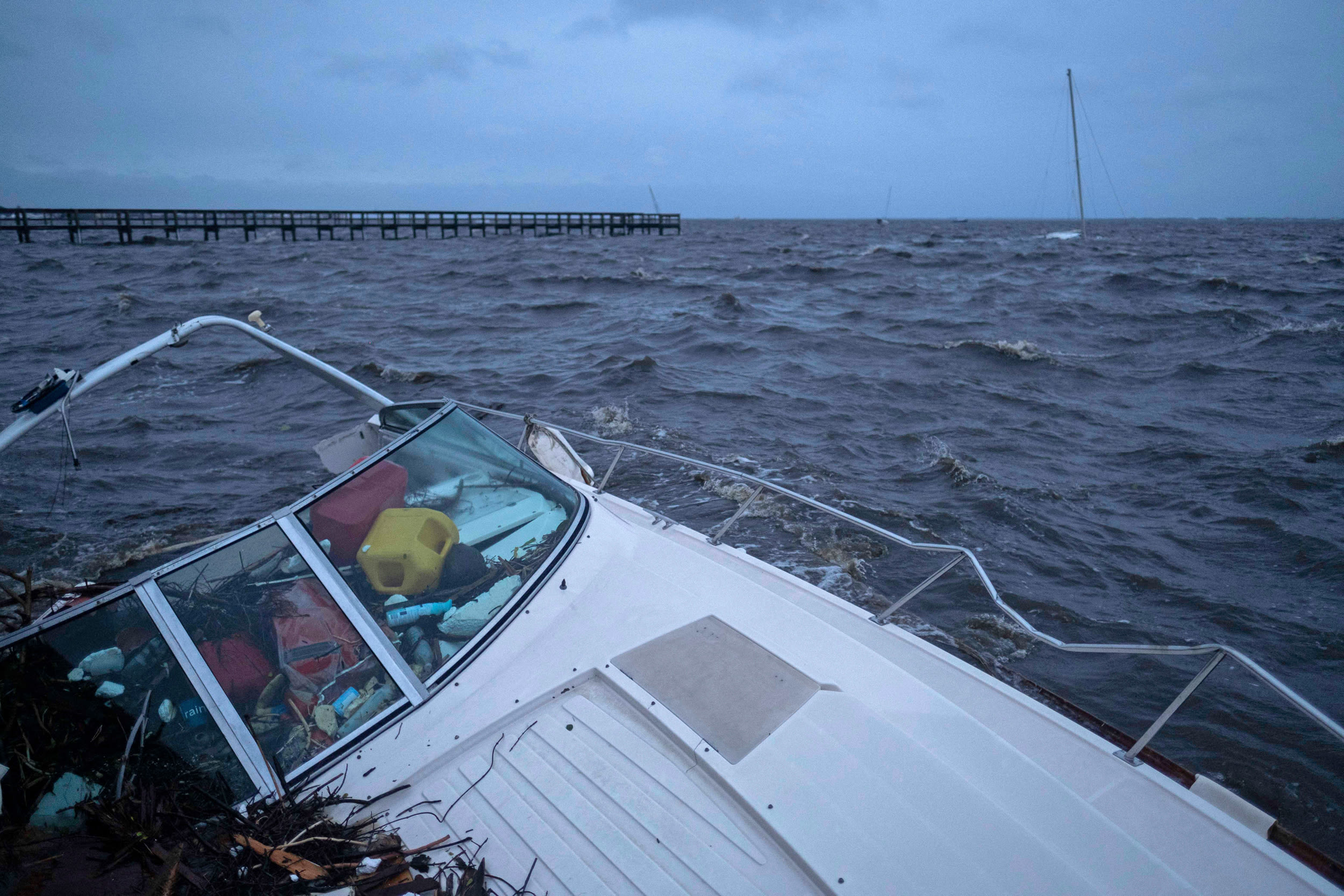 A partially submerged boat in Punta Gorda.