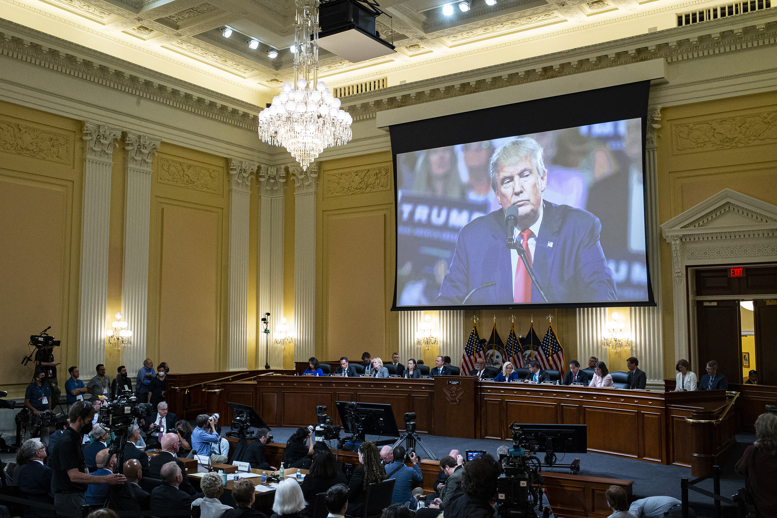 WASHINGTON, DC - JUNE 21: Former U.S. President Donald Trump is displayed on a screen during the fourth hearing on the January 6th investigation in the Cannon House Office Building on June 21, 2022 in Washington, DC. The bipartisan committee, which has been gathering evidence for almost a year related to the January 6 attack at the U.S. Capitol, is presenting its findings in a series of televised hearings. On January 6, 2021, supporters of former President Donald Trump attacked the U.S. Capitol Building during an attempt to disrupt a congressional vote to confirm the electoral college win for President Joe Biden.