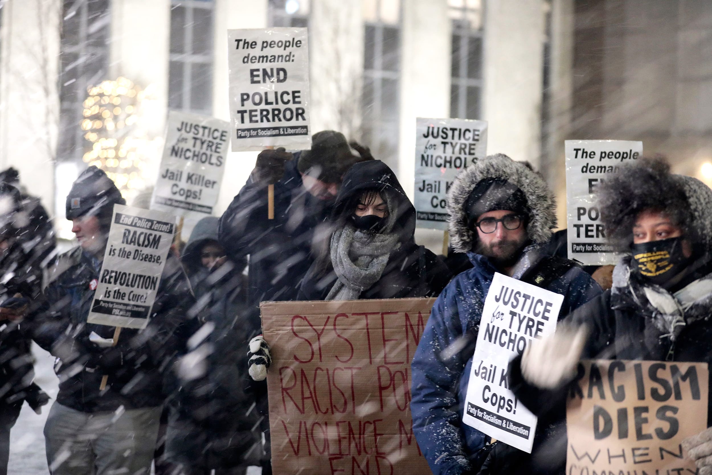 Protesters rally against the fatal police assault of Tyre Nichols, outside of the Coleman A. Young Municipal Center in Detroit, Michigan, on January 27, 2023. - The US city of Memphis released January 27, 2023 graphic video footage depicting the fatal police assault of a 29-year-old Black man, as cities nationwide braced for a night of protests against police brutality. Five Memphis officers, also all Black, were charged with second-degree murder in the beating of Tyre Nichols, who died in hospital on January 10 three days after being stopped on suspicion of reckless driving.