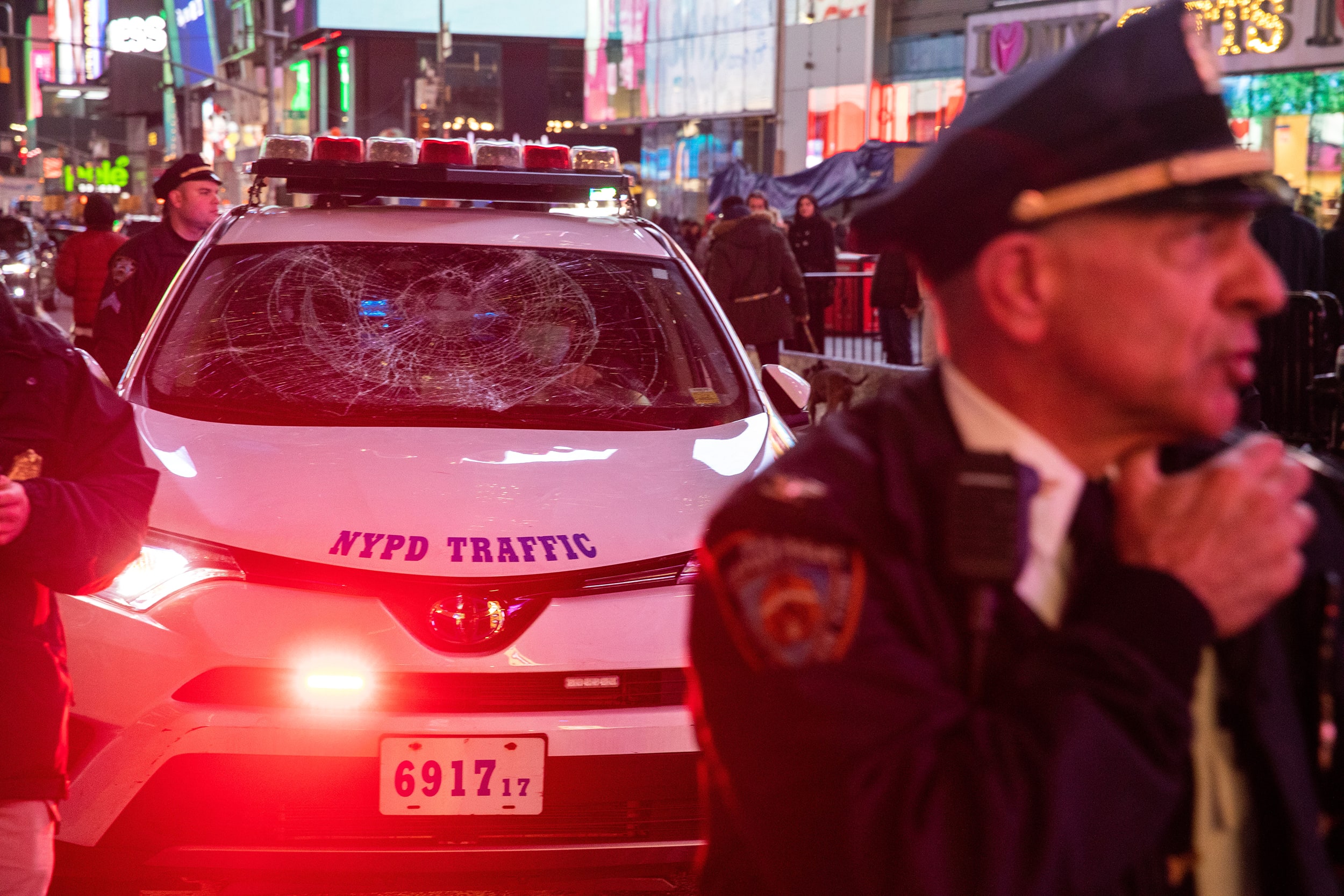 Police move a vehicle that was damaged by protesters in New York on Jan. 27, 2023, following the release of body cam footage showing Memphis police beating Tyre Nichols, who later died. Julius Constantine Motal / NBC News