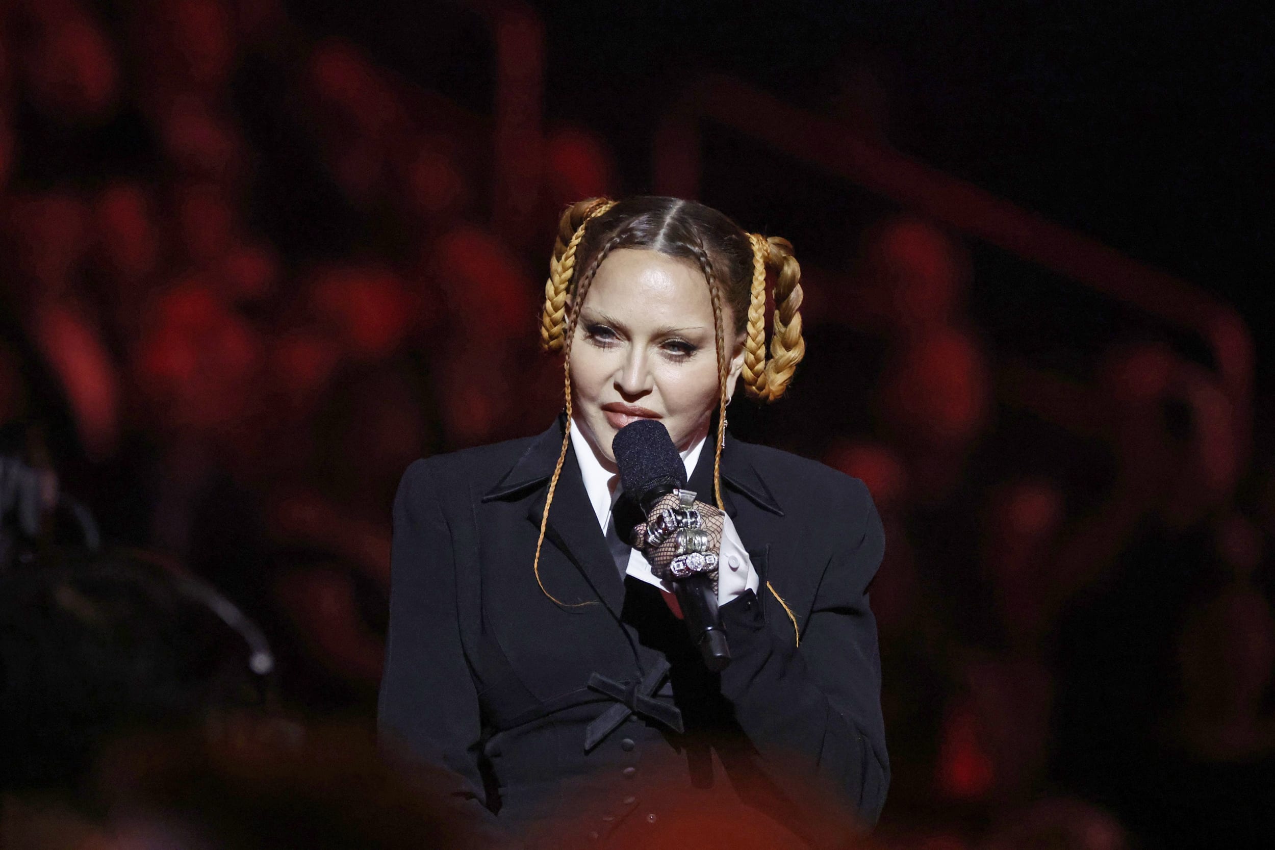 Madonna speaks at the Grammy Awards.
