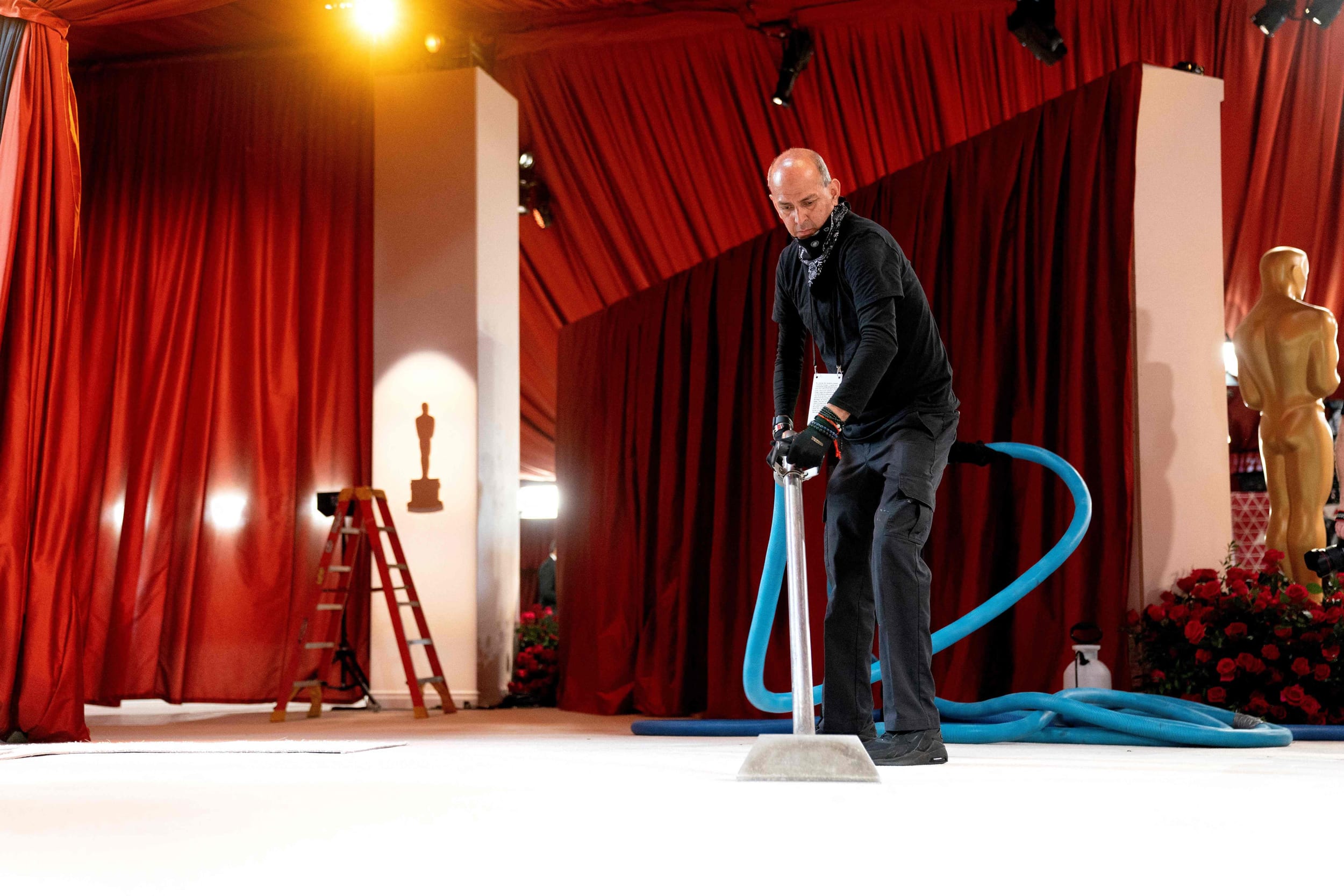 Preparations are made along the champagne carpet ahead of the Academy Awards in Hollywood, Calif.