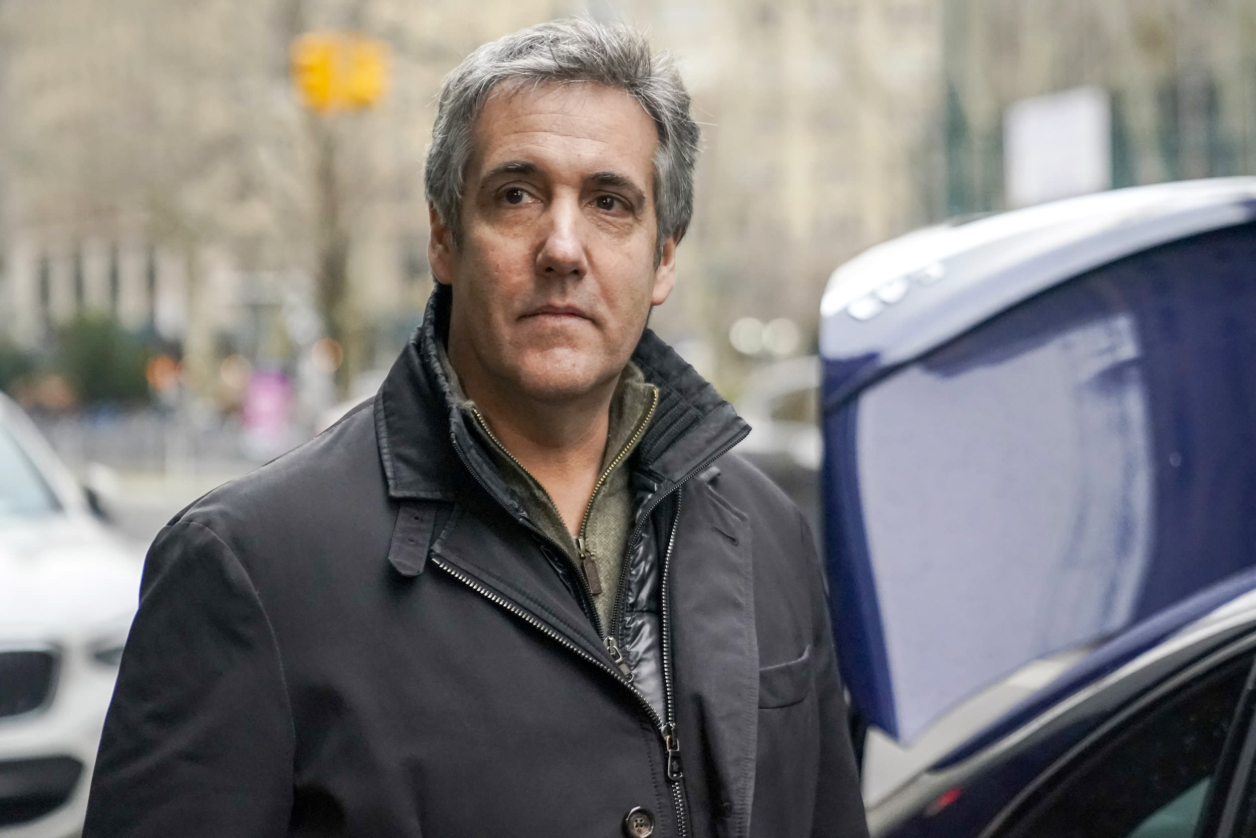 Michael Cohen leaves a lower Manhattan building after meeting with prosecutors, Friday, March 10, 2023, in New York.