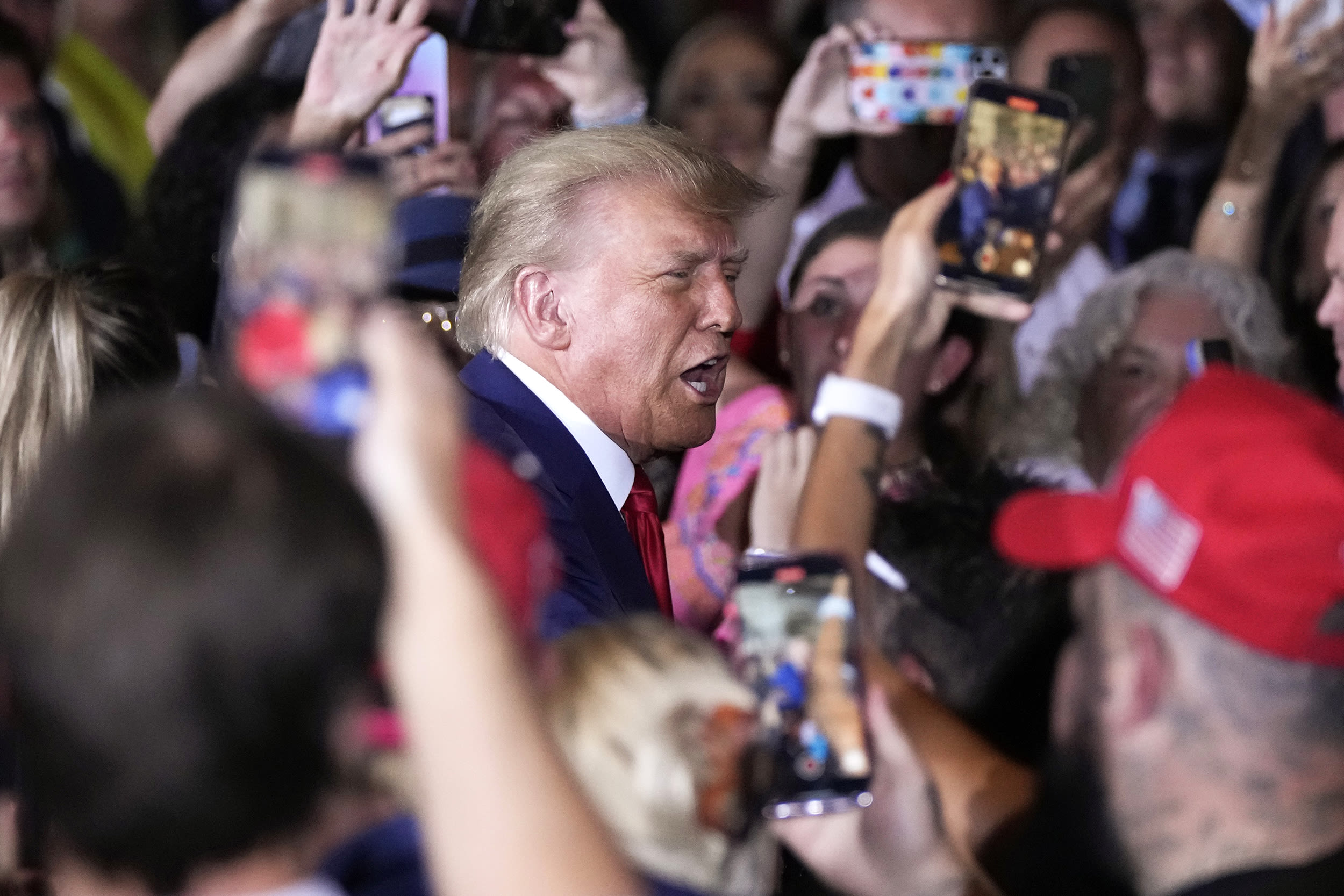 Former President Donald Trump arrives to speak at his Mar-a-Lago estate hours after being arraigned in New York City, Tuesday, April 4, 2023, in Palm Beach, Fla. (AP Photo/Rebecca Blackwell)