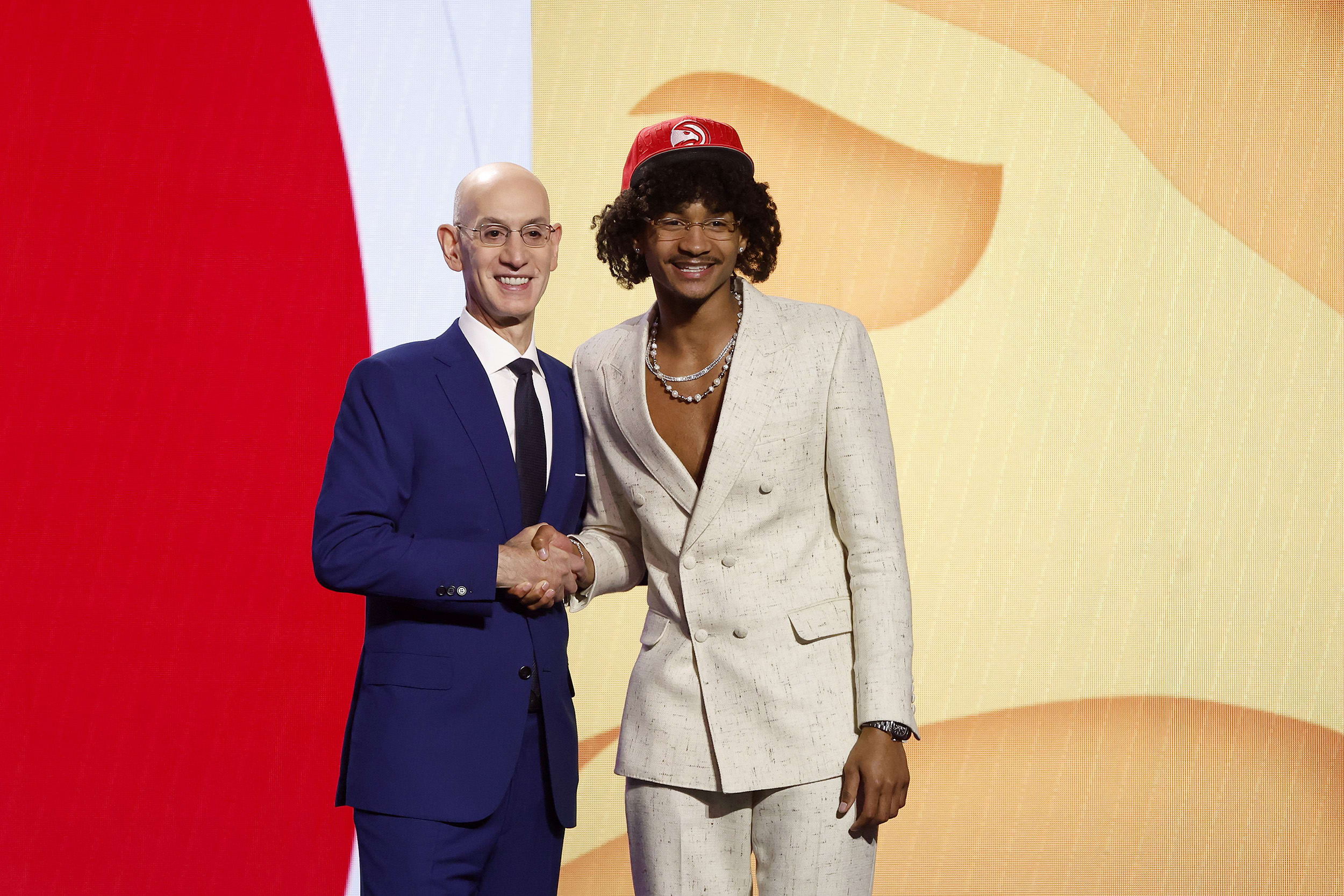 NEW YORK, NEW YORK - JUNE 22: Kobe Bufkin (R) poses with NBA commissioner Adam Silver (L) after being drafted 15th overall pick by the Atlanta Hawks during the first round of the 2023 NBA Draft at Barclays Center on June 22, 2023 in the Brooklyn borough of New York City. 