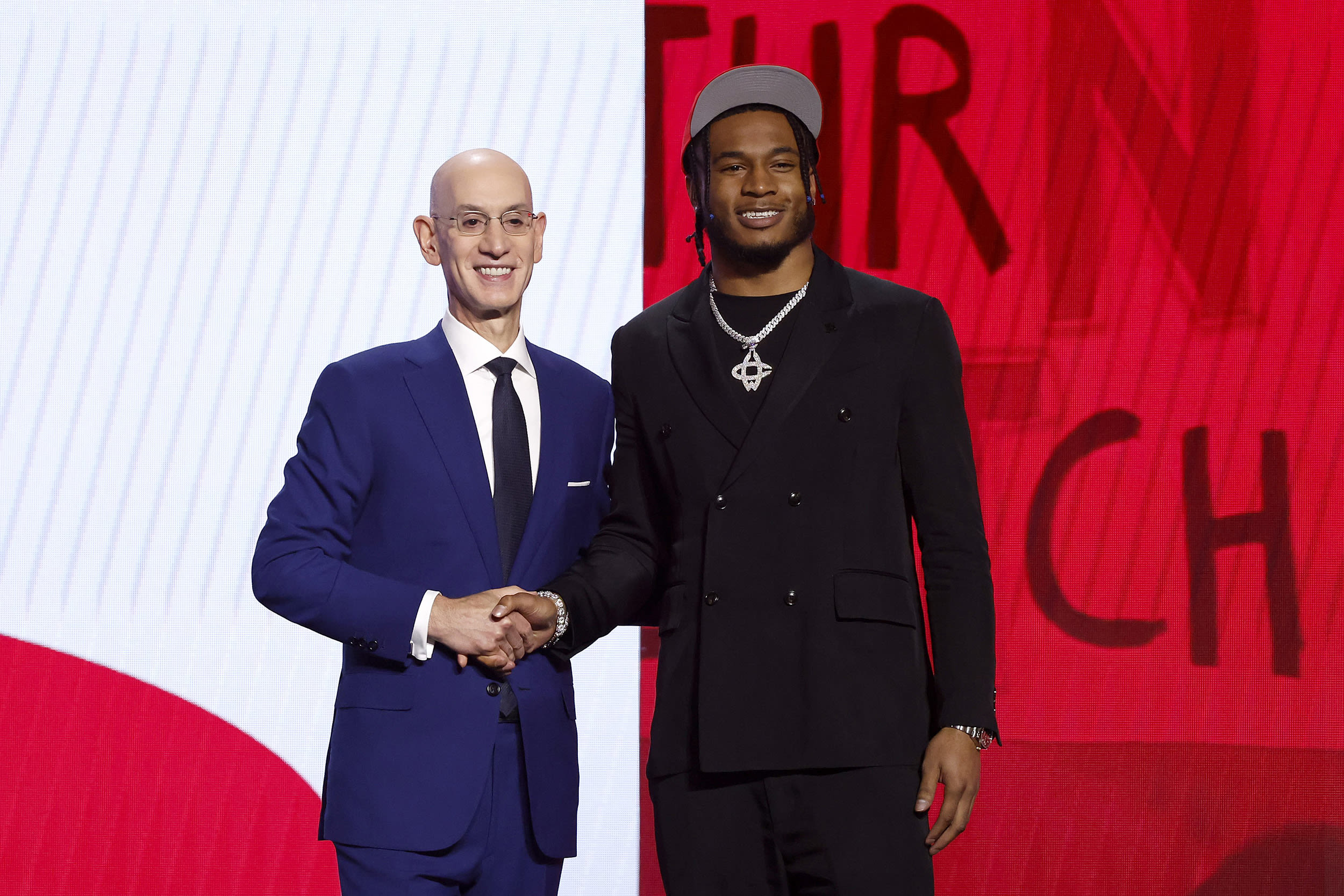 NEW YORK, NEW YORK - JUNE 22: Cam Whitmore (R) poses with NBA commissioner Adam Silver (L) after being drafted 20th overall pick by the Houston Rockets during the first round of the 2023 NBA Draft at Barclays Center on June 22, 2023 in the Brooklyn borough of New York City.
