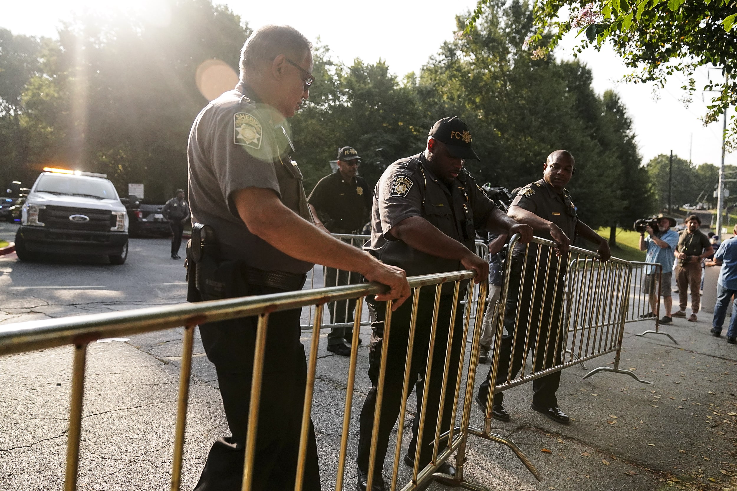 Image: Authorities put up barricades outside of the Fulton County Jail on Aug. 24, 2023, in Atlanta.