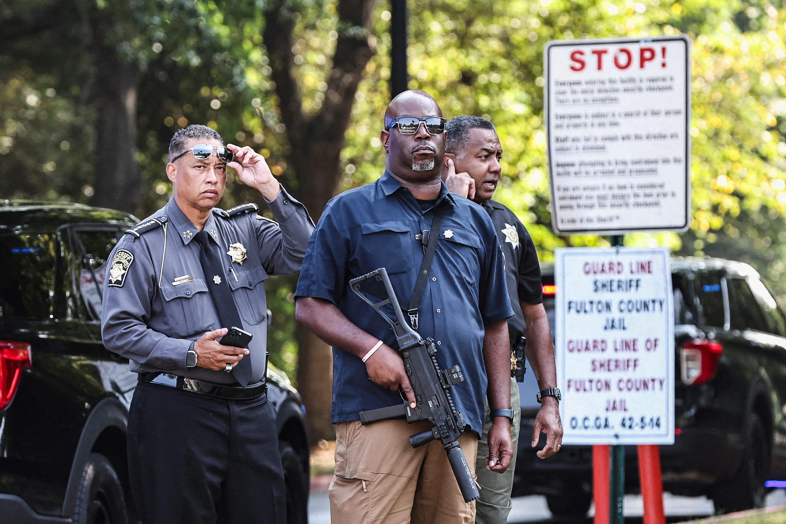 Patrick Labat, Sheriff of Fulton County walks next to the entrance of the Fulton County Jail, as former President Donald Trump is expected to turn himself in to be processed after his Georgia indictment, in Atlanta on Aug. 24, 2023.