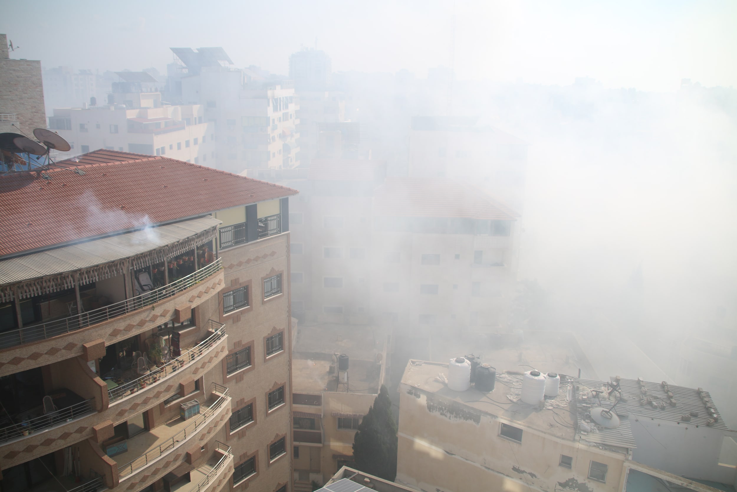Smoke fills the air after Israeli aircraft bombed the area west of Gaza City on Oct. 11, 2023.