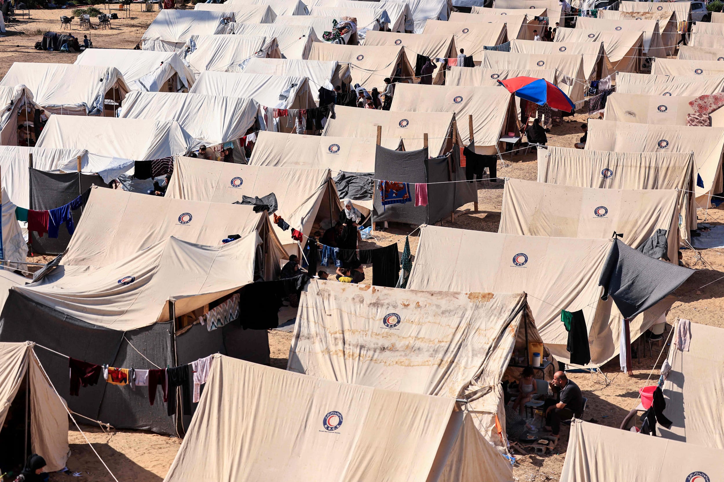 Tents for Palestinians seeking refuge are set up on the grounds of an UNRWA centre in Khan Yunis in the southern Gaza Strip.