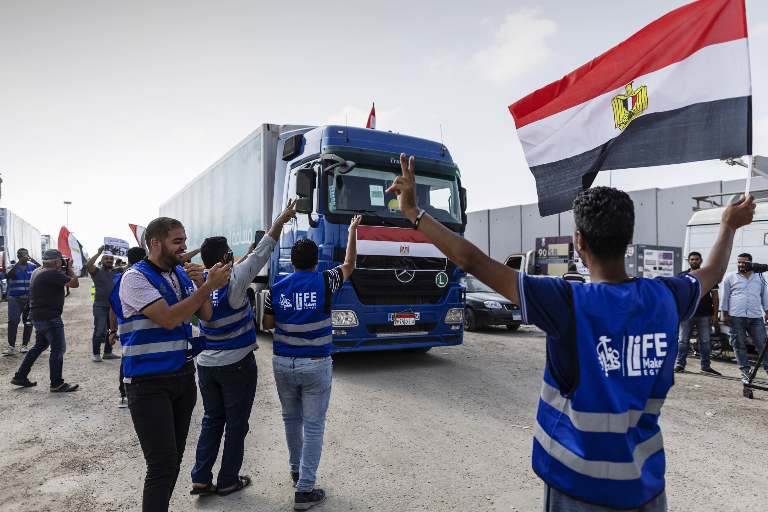 The second convoy of aid trucks cross the Rafah border from the Egyptian side on Oct. 22, 2023 in North Sinai, Egypt.