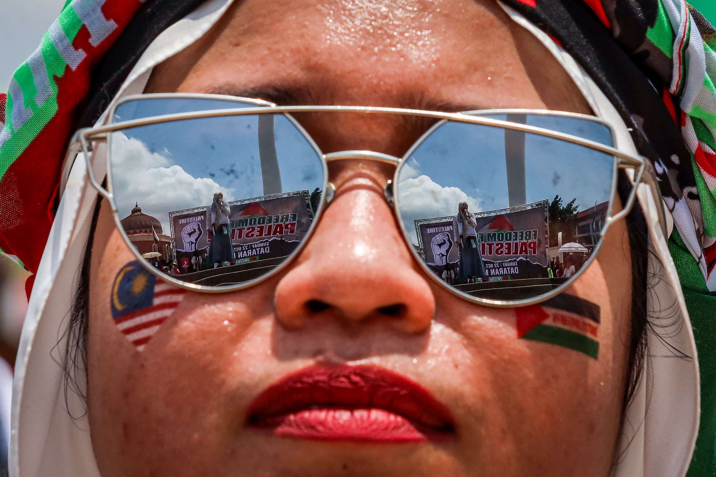 People attend a Freedom for Palestine rally at Merdeka Square in Kuala Lumpur, Malaysia.