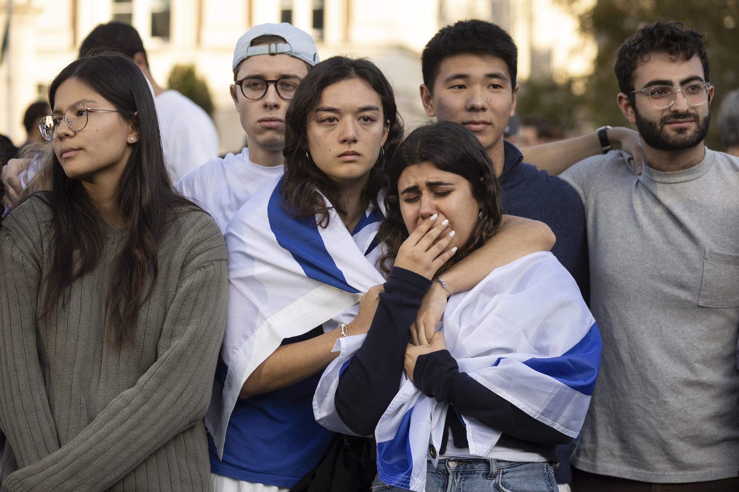 Pro-Israel demonstrators react while singing a song during a protest at Columbia University on Oct. 12, 2023, in New York.
