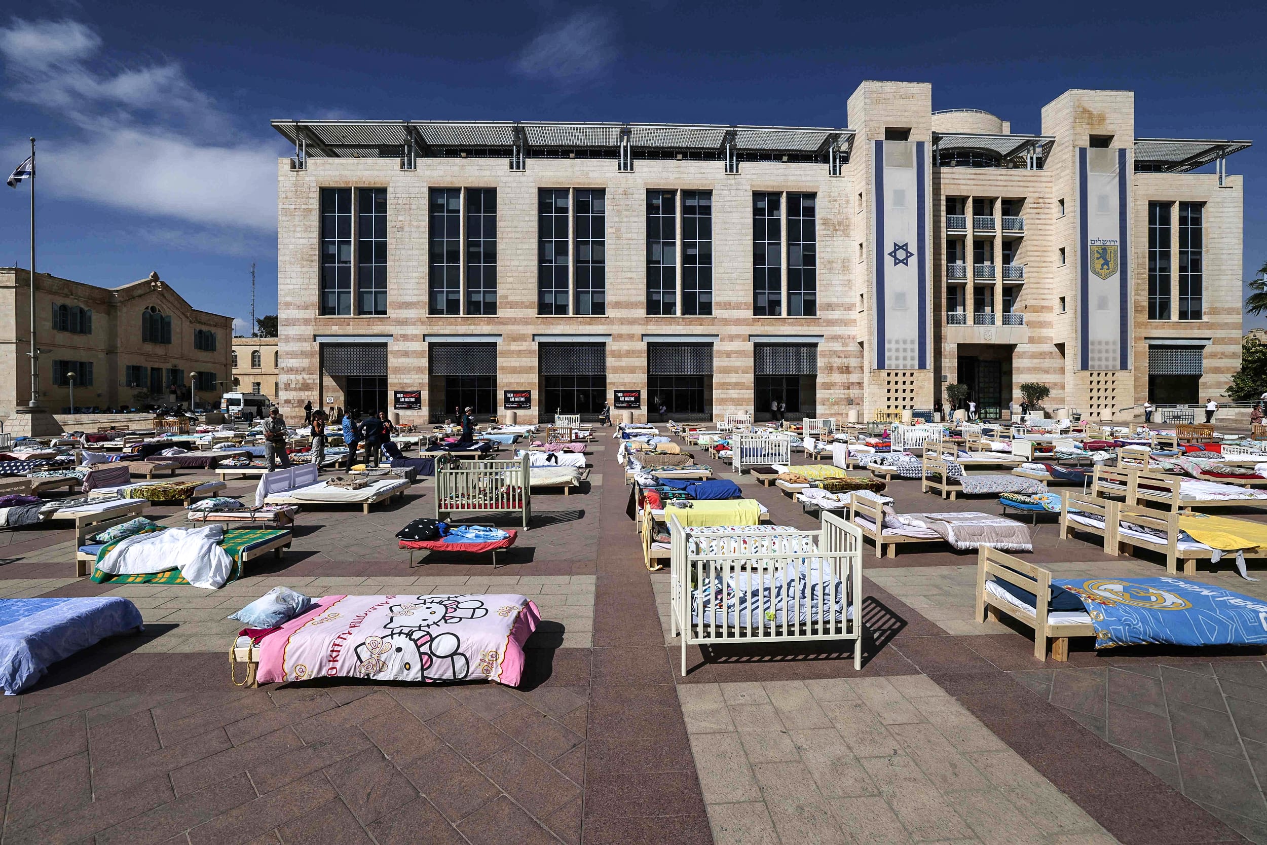 Image: Beds representing the number of Israeli hostages held by Palestinian militants