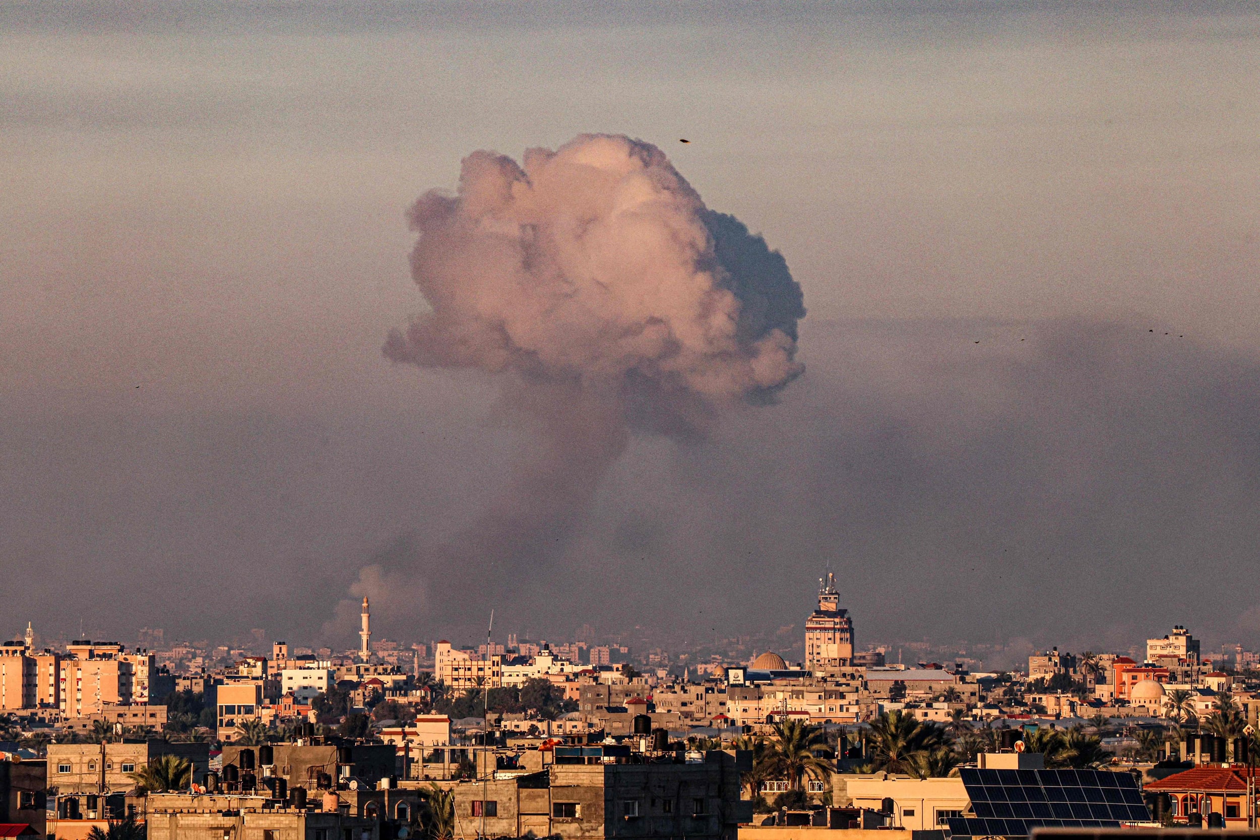 Smoke billows following an Israeli strike on Khan Yunis in the southern Gaza strip on Novembr 16, 2023.